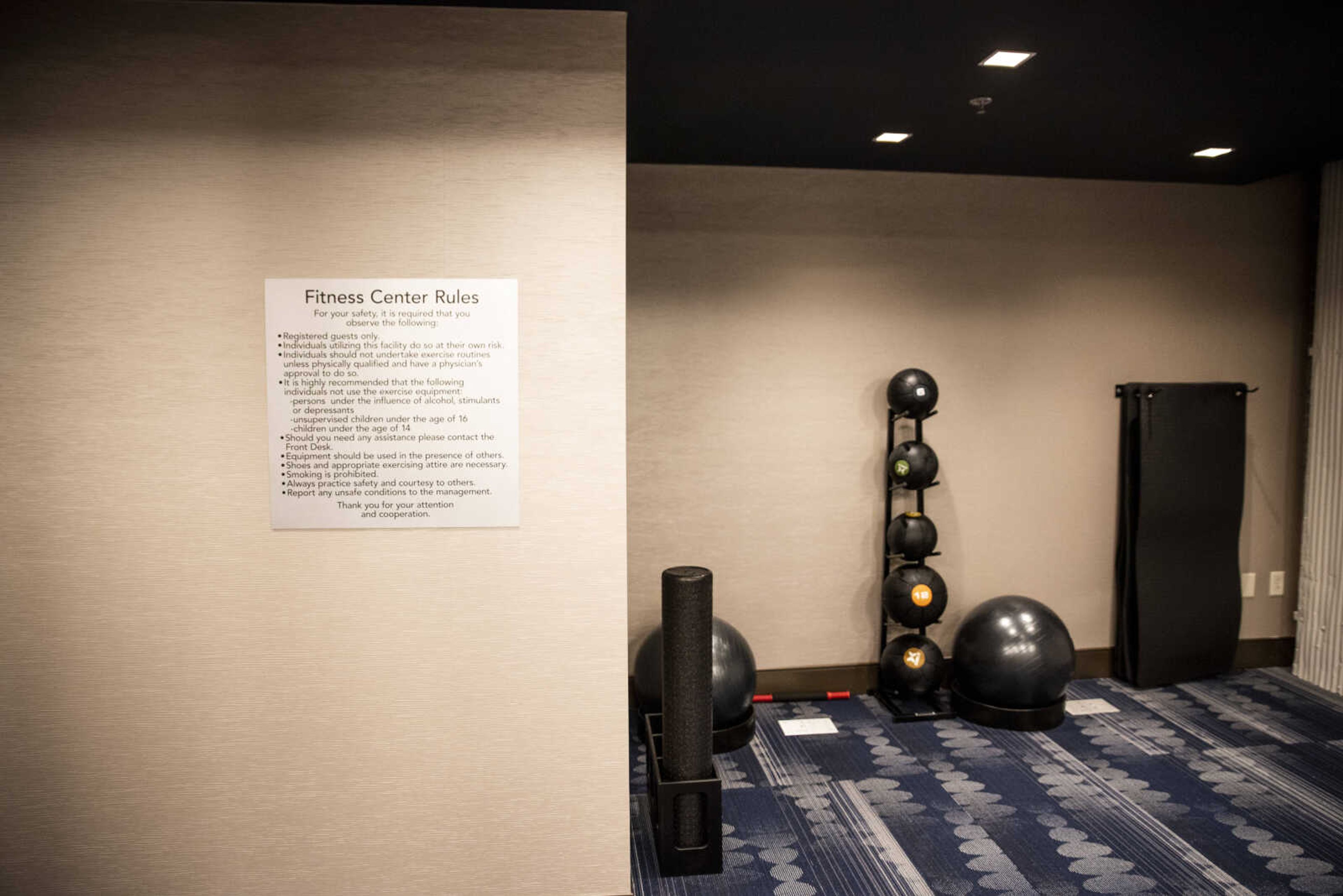 A "Fitness Center Rules" sign hangs next to the yoga space of the gym space of the new Courtyard by Marriott hotel in Downtown Cape Monday, Oct. 29, 2018, in Cape Girardeau.