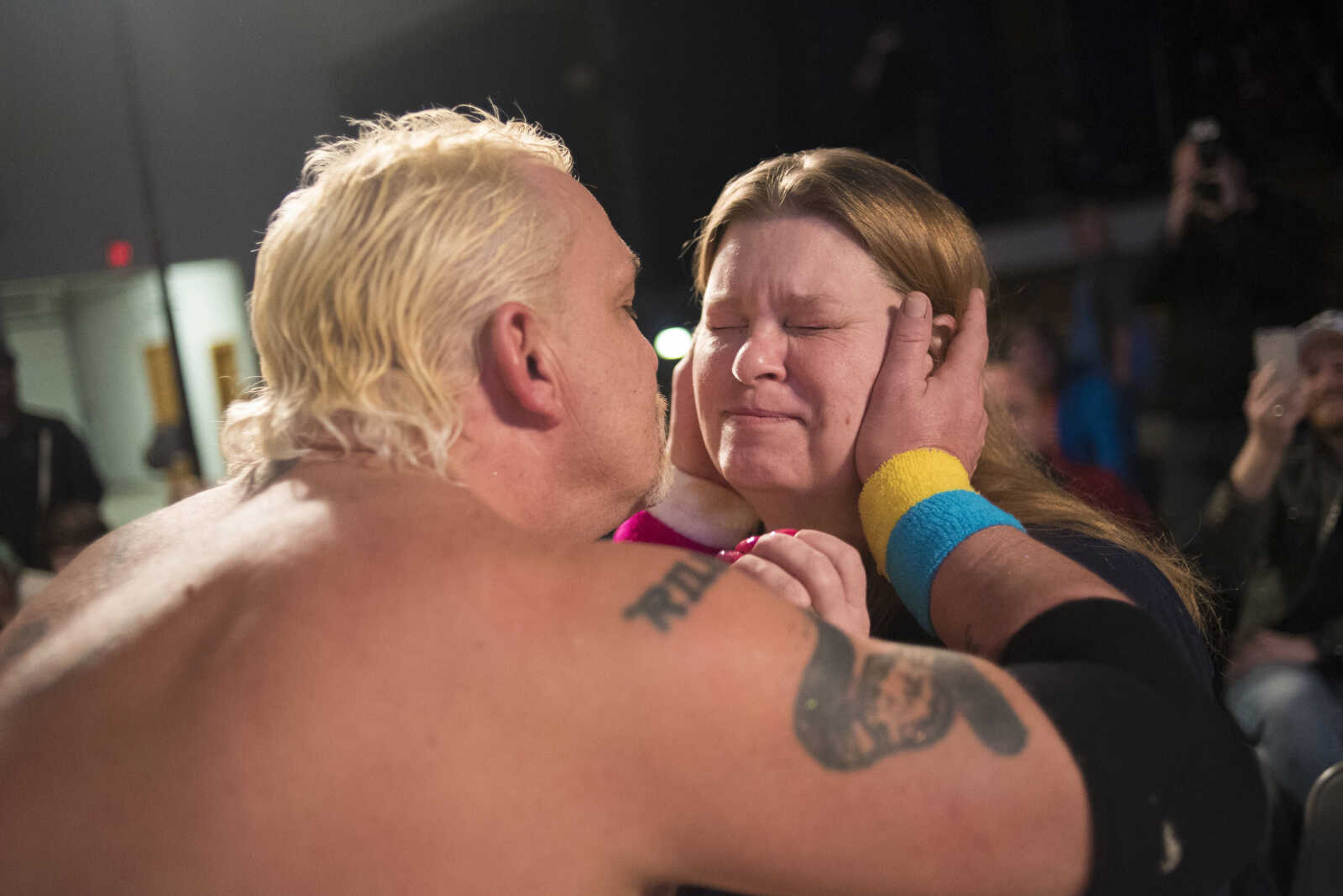 Sexy Sarge O'Riley kisses Janice Aaro during the Cape Championship Wrestling match Saturday, Jan. 28, 2017 at the Arena Building in Cape Girardeau.