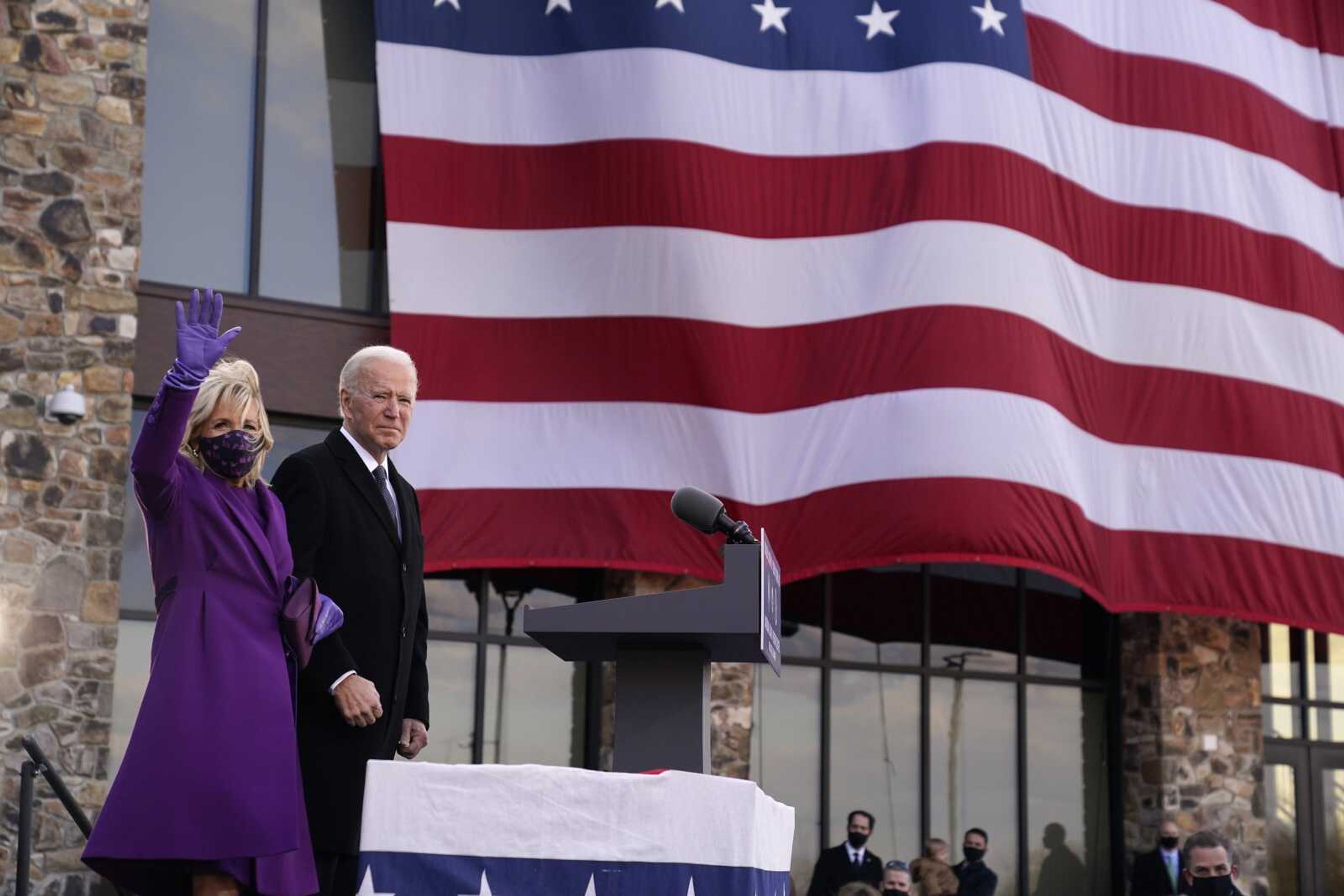 President-elect Joe Biden stands with his wife, Jill Biden, after speaking at the Major Joseph R. "Beau" Biden III National Guard/Reserve Center on Tuesday in New Castle, Delaware.