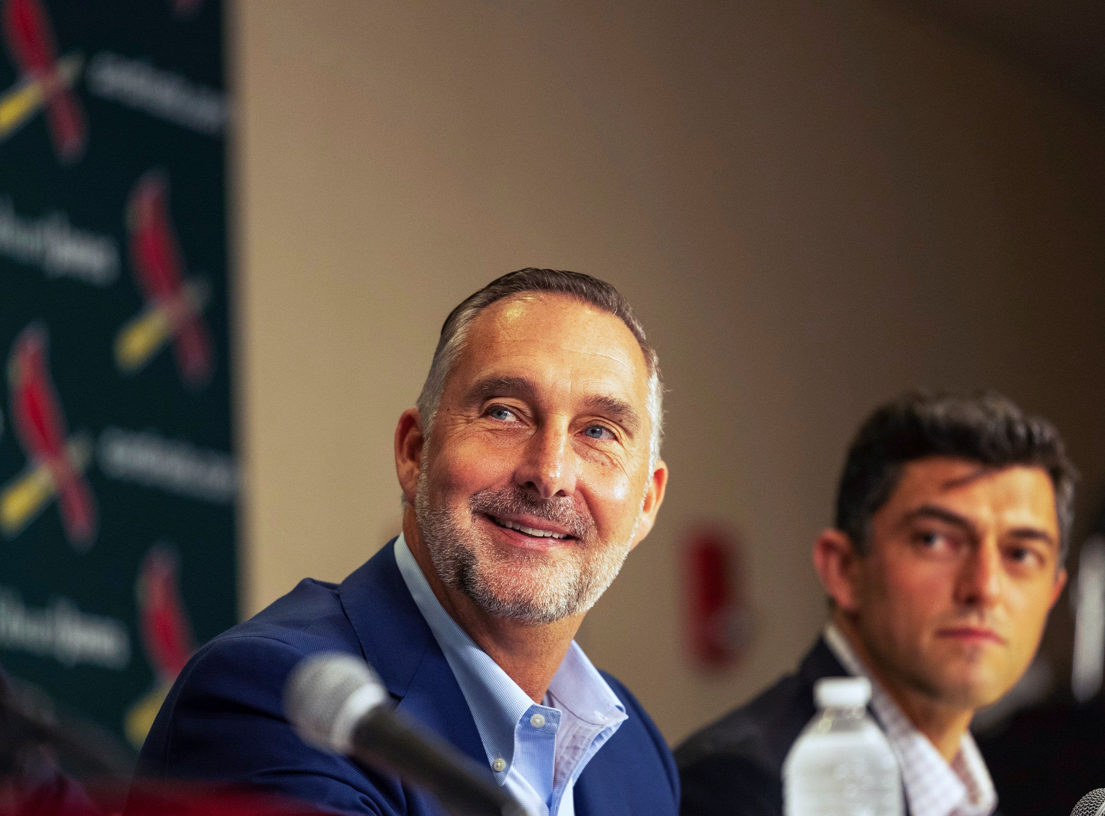 St. Louis Cardinals President of baseball operations John Mozeliak, left, fields questions from reporters as Chaim Bloom looks on during a press conference Monday, Sept. 30, 2024, at Busch Stadium in St. Louis. (Zachary Linhares/St. Louis Post-Dispatch via AP)