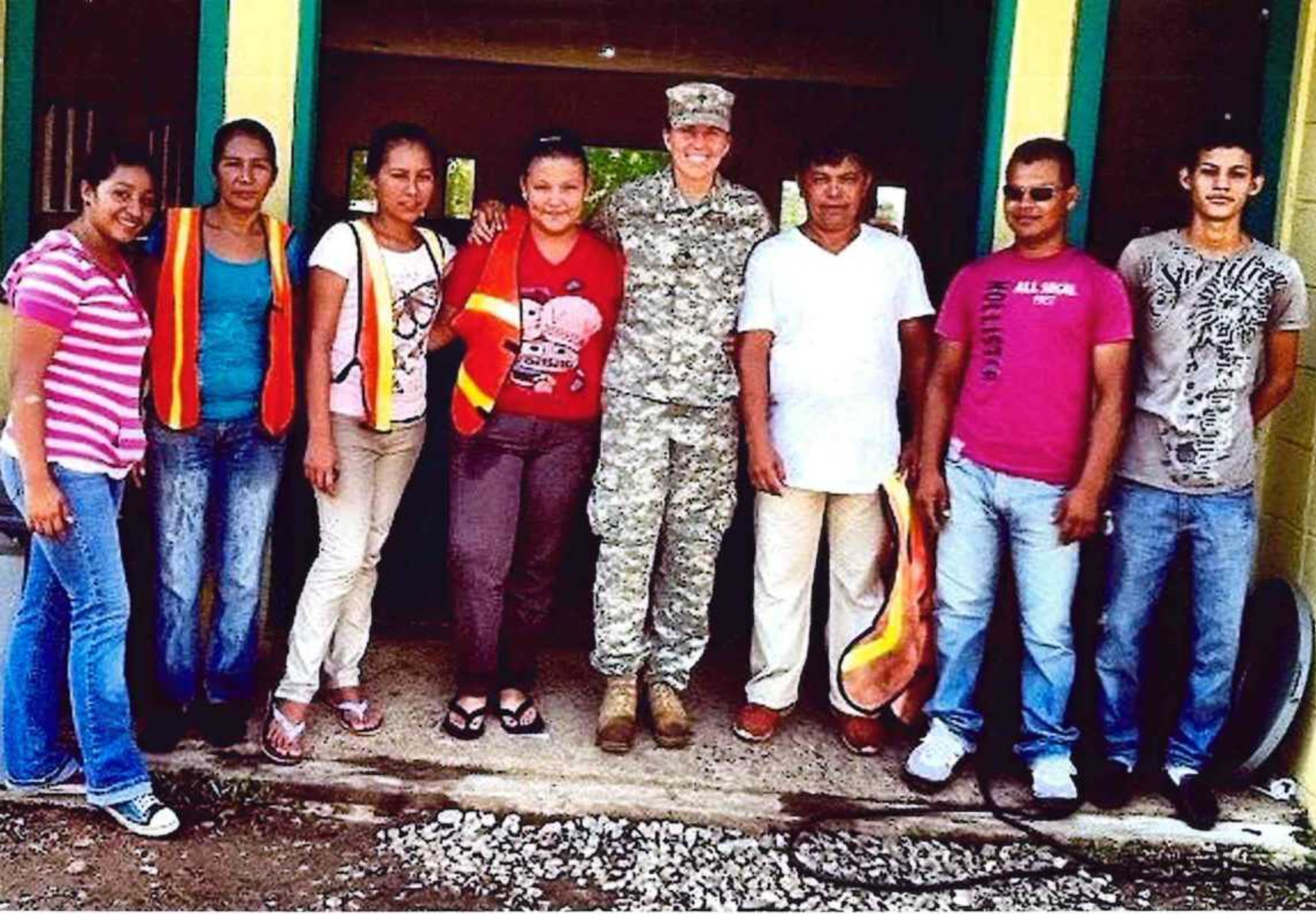 One National Guard mission took Erin Tomkins, center, to Honduras, where her unit provided medical help and built schools.