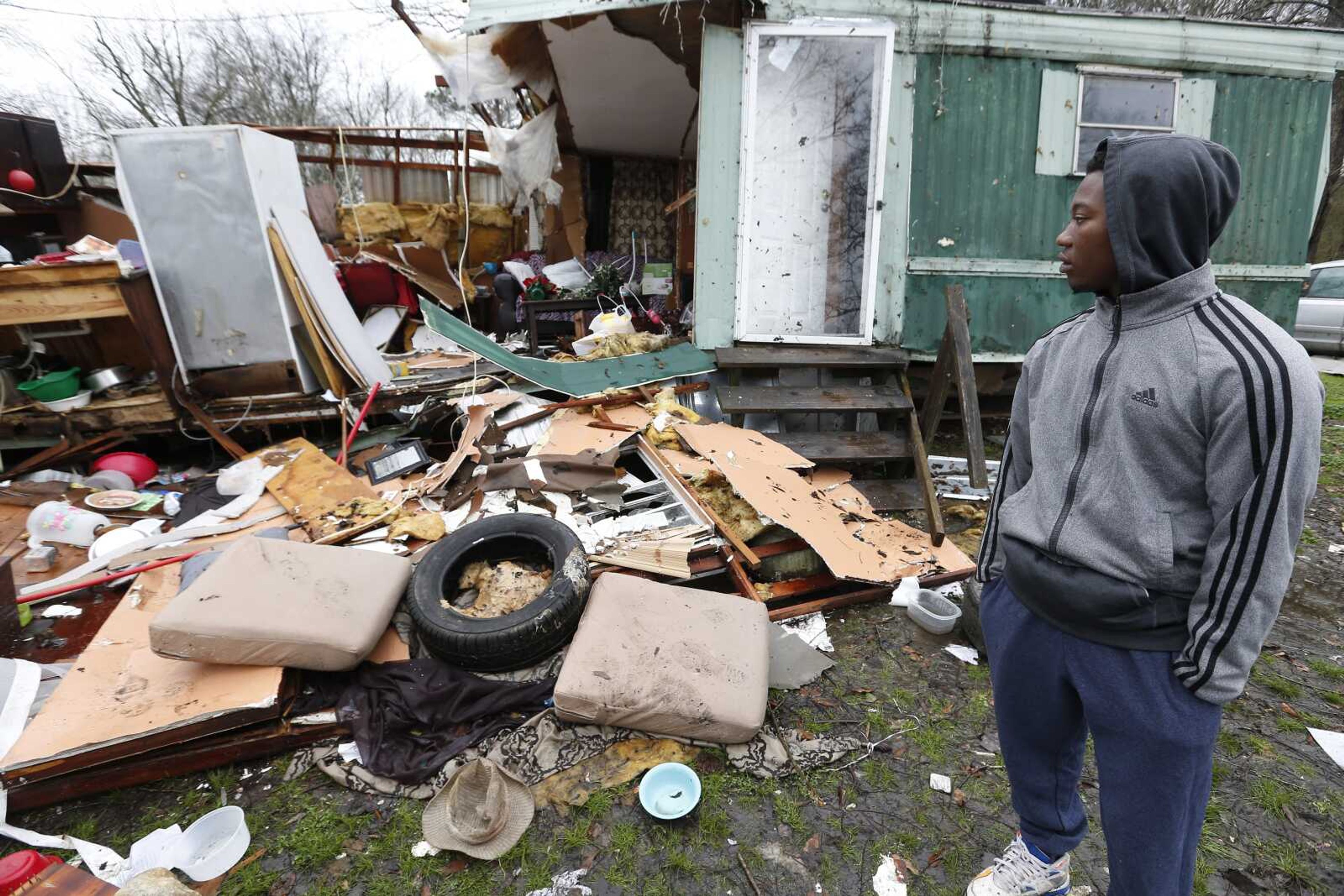 "It sounded like it was coming for us," said DeMarkus Sly, 19, as he surveyed the remains of his grandmother's home Thursday in Pickens, Mississippi, following Wednesday's series of storms that hit Mississippi. The home was occupied by five family members including Sly, but none were seriously injured when the home was destroyed by the winds.