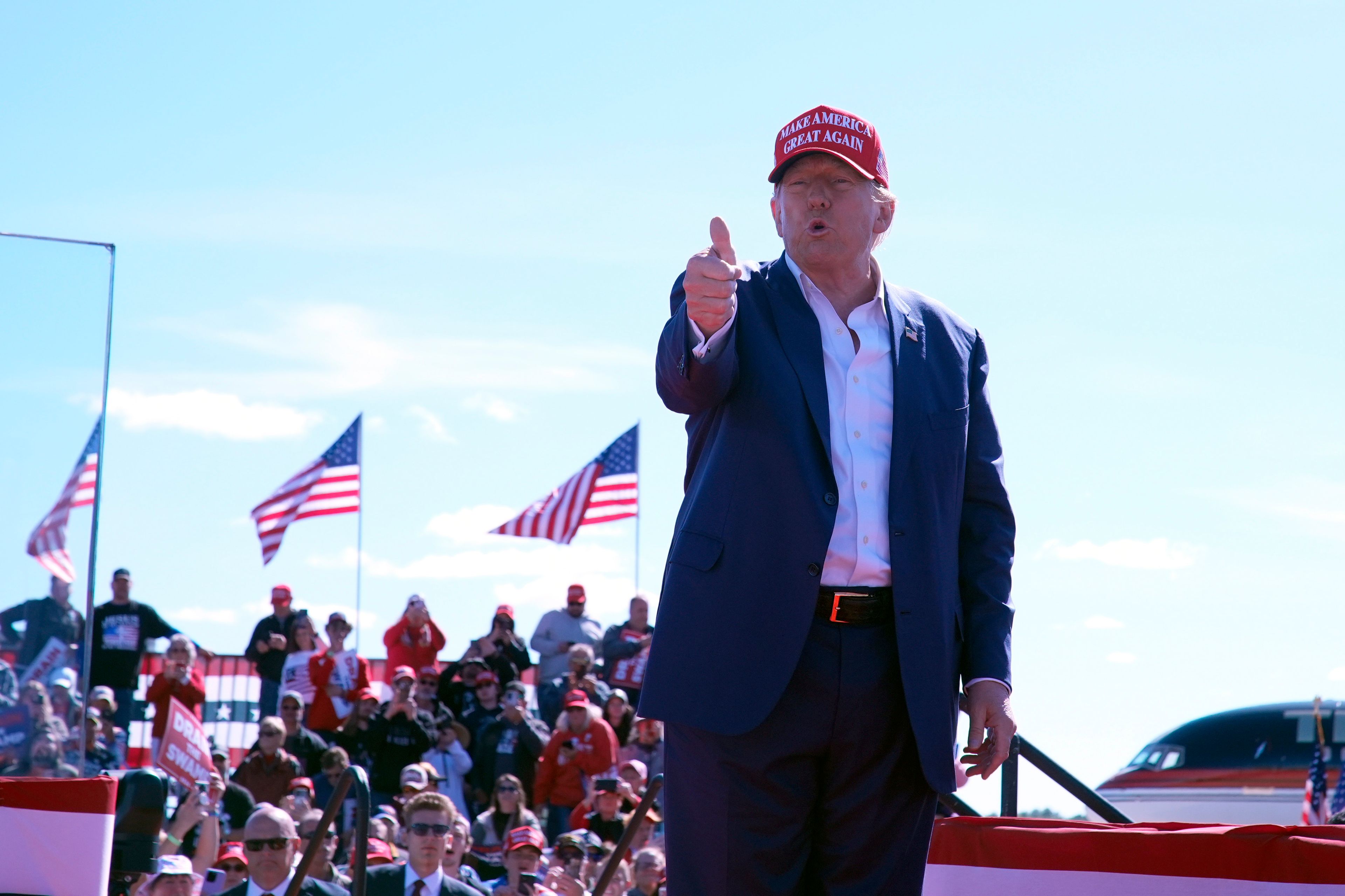 Republican presidential nominee former President Donald Trump gestures as he departs a campaign event at Central Wisconsin Airport, Saturday, Sept. 7, 2024, in Mosinee, Wis. (AP Photo/Alex Brandon)