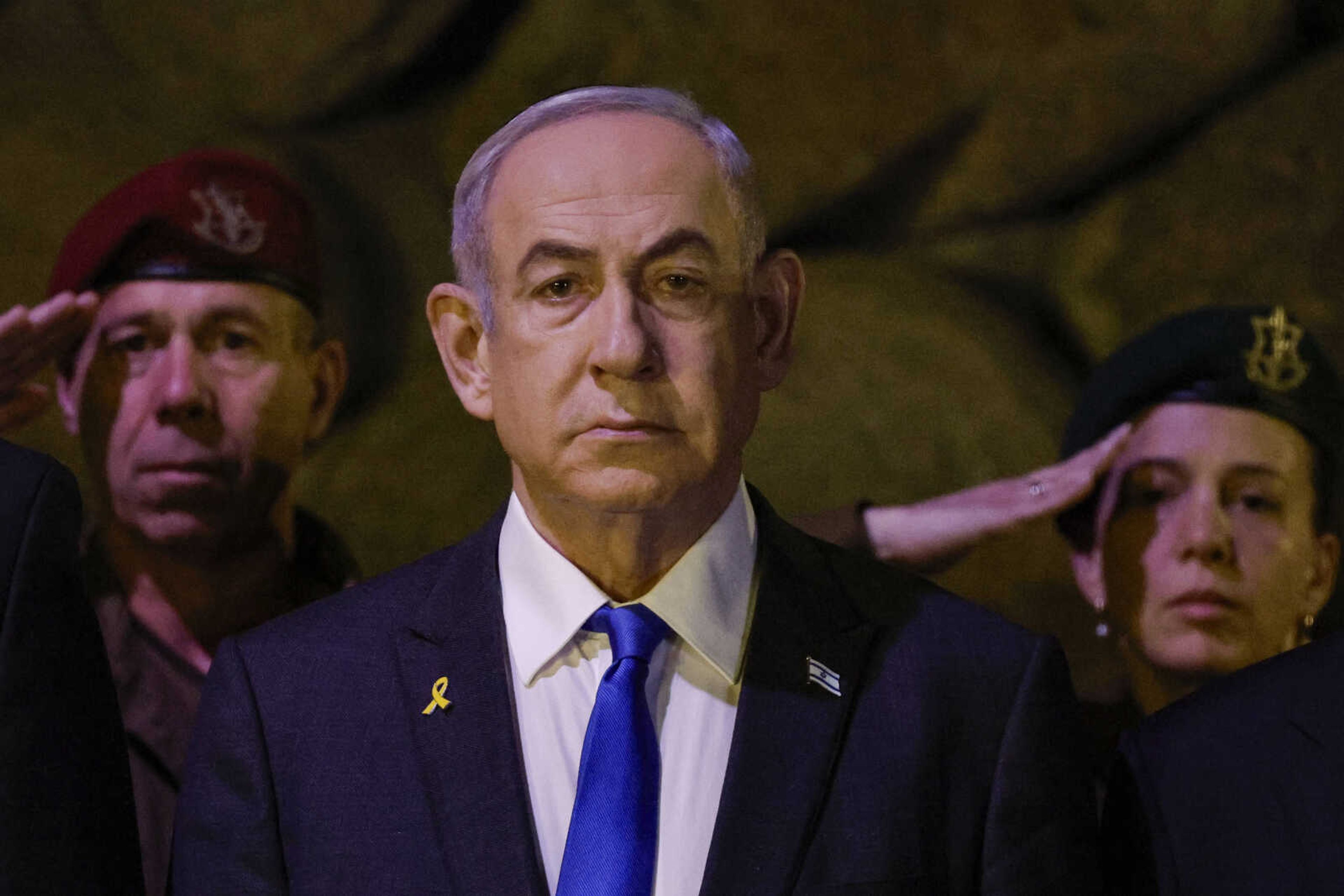 Israeli Prime Minister Benjamin Netanyahu, front, attends a wreath-laying ceremony marking Holocaust Remembrance Day in the Hall of Remembrance at Yad Vashem, the World Holocaust Remembrance Centre, in Jerusalem, Israel, on May 6, 2024. The cease-fire proposal announced by President Joe Biden has placed Prime Minister Netanyahu at a crossroads, with either path likely to shape the legacy of Israel's longest-serving and deeply divisive leader. 