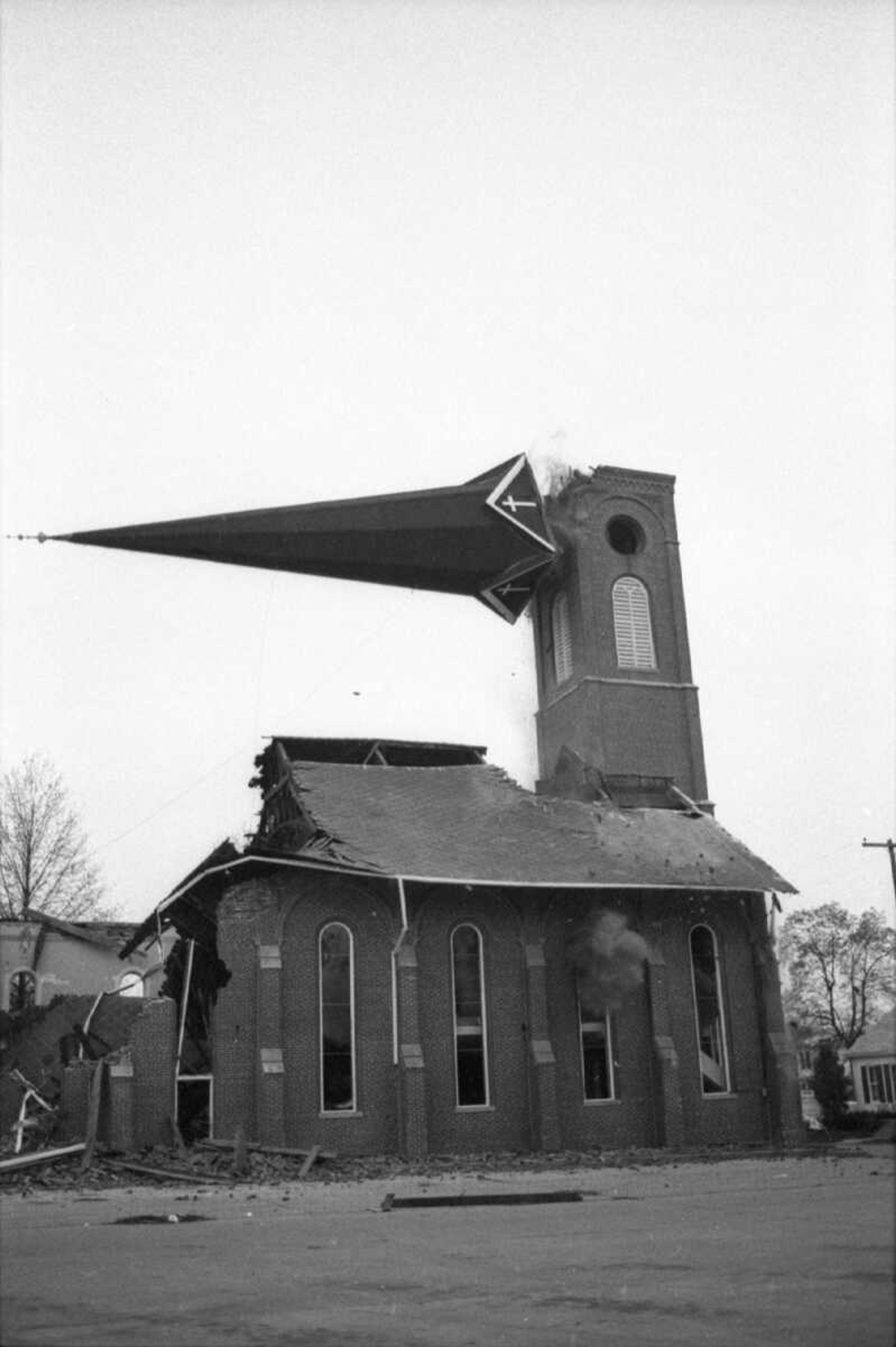 Published 19 April 1979, pg. 1
(Demolition of Trinity Lutheran Church, Frederick and Themis streets.) (Missourian archive photo by Fred Lynch)