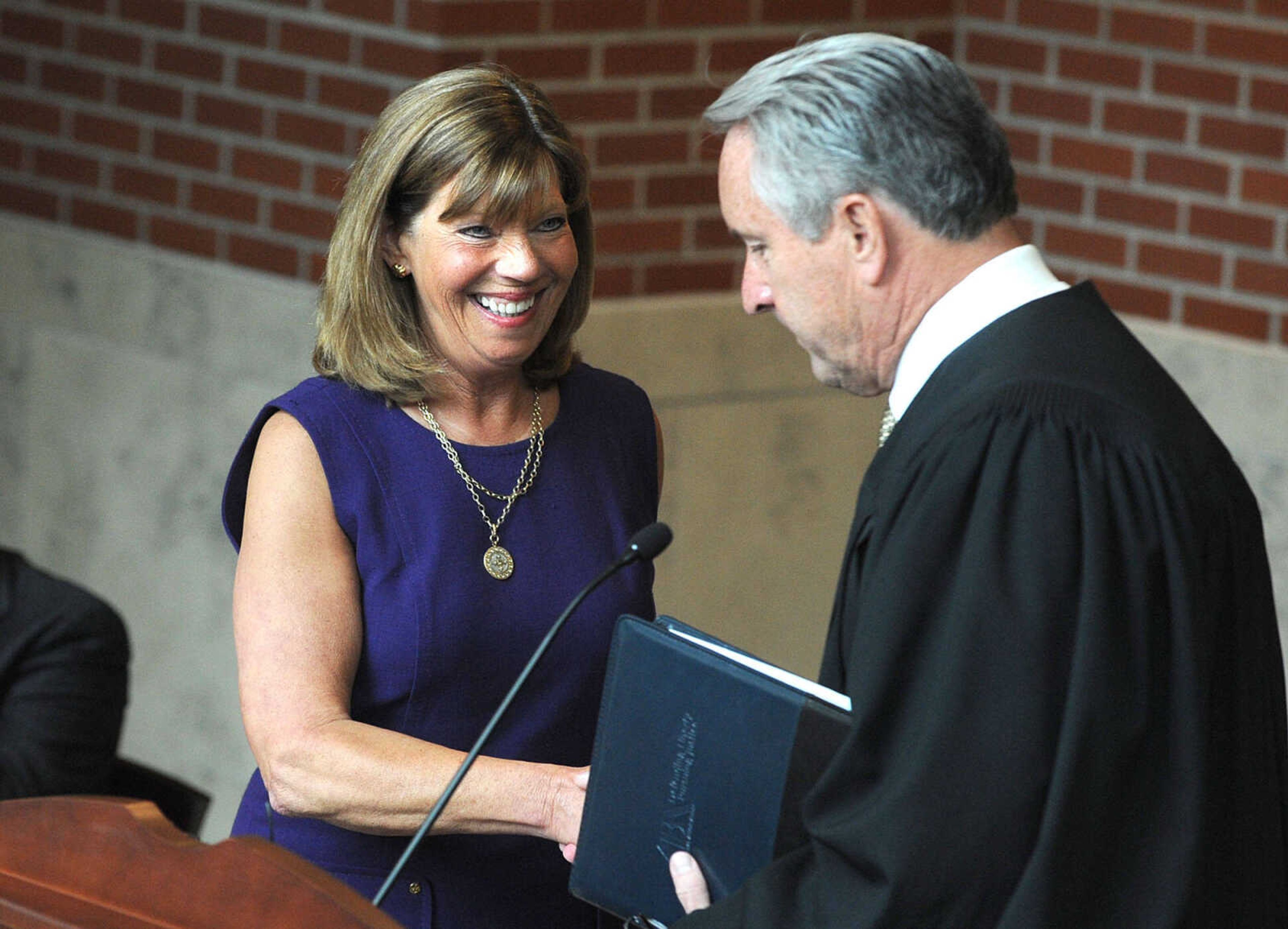 LAURA SIMON ~ lsimon@semissourian.com
Federal District Judge Stephen N. Limbaugh, Jr. welcomes guest speaker Rep. Jo Ann Emerson Tuesday, May 1, 2012 at the Rush Hudson Limbaugh, Sr. U.S. Courthouse in Cape Girardeau. Seventeen petitioners became citizens of the United States of America during Tuesday's naturalization ceremony.