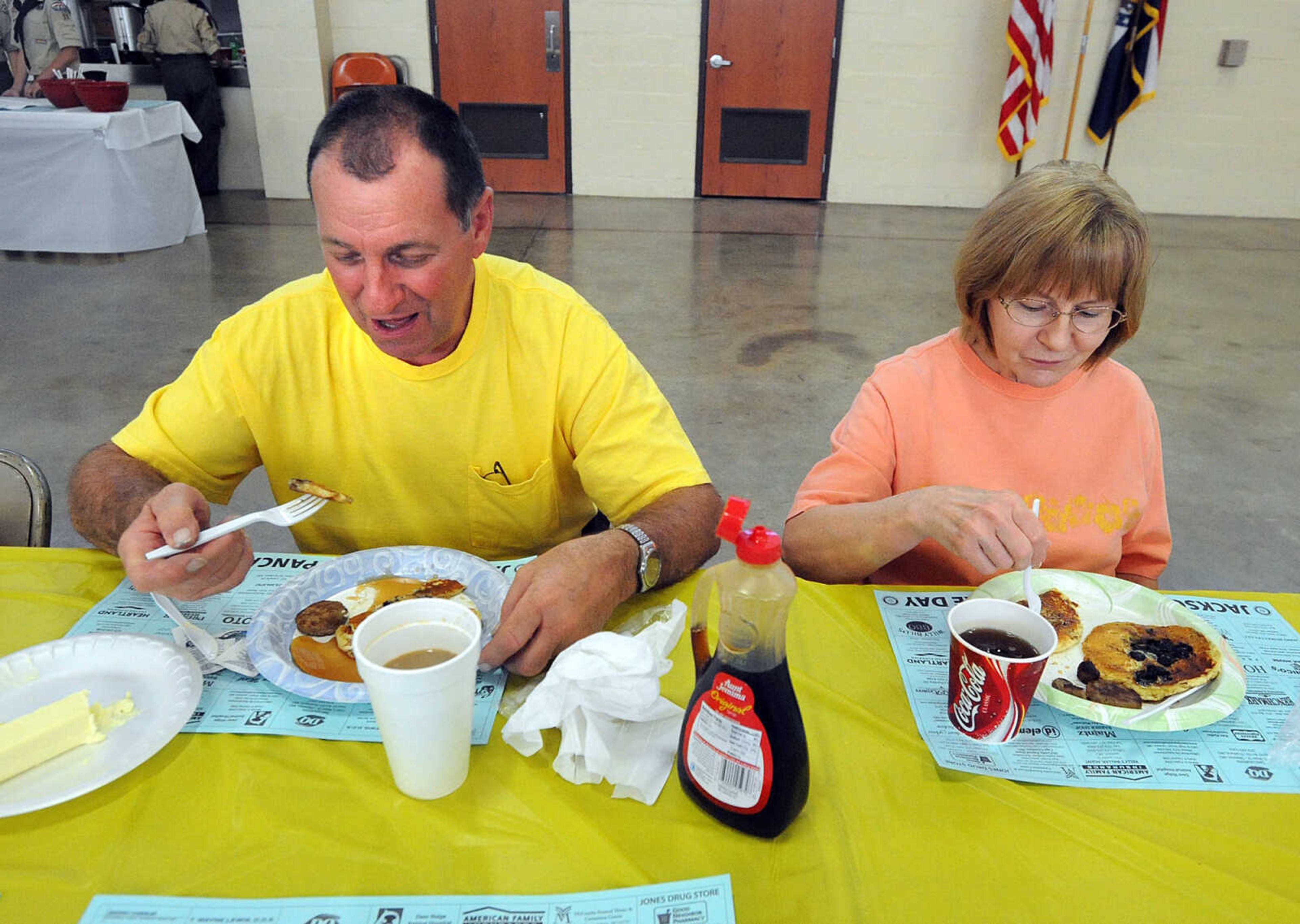 LAURA SIMON ~ lsimon@semissourian.com
Bill and Doris Weissmueller enjoy a pancake dinner Tuesday, Oct. 23, 2012 during the Jackson Rotary Pancake Day at the National Guard Armory. People could pick from plain, chocolate chip, pecan and blueberry pancakes and a side of sausage.