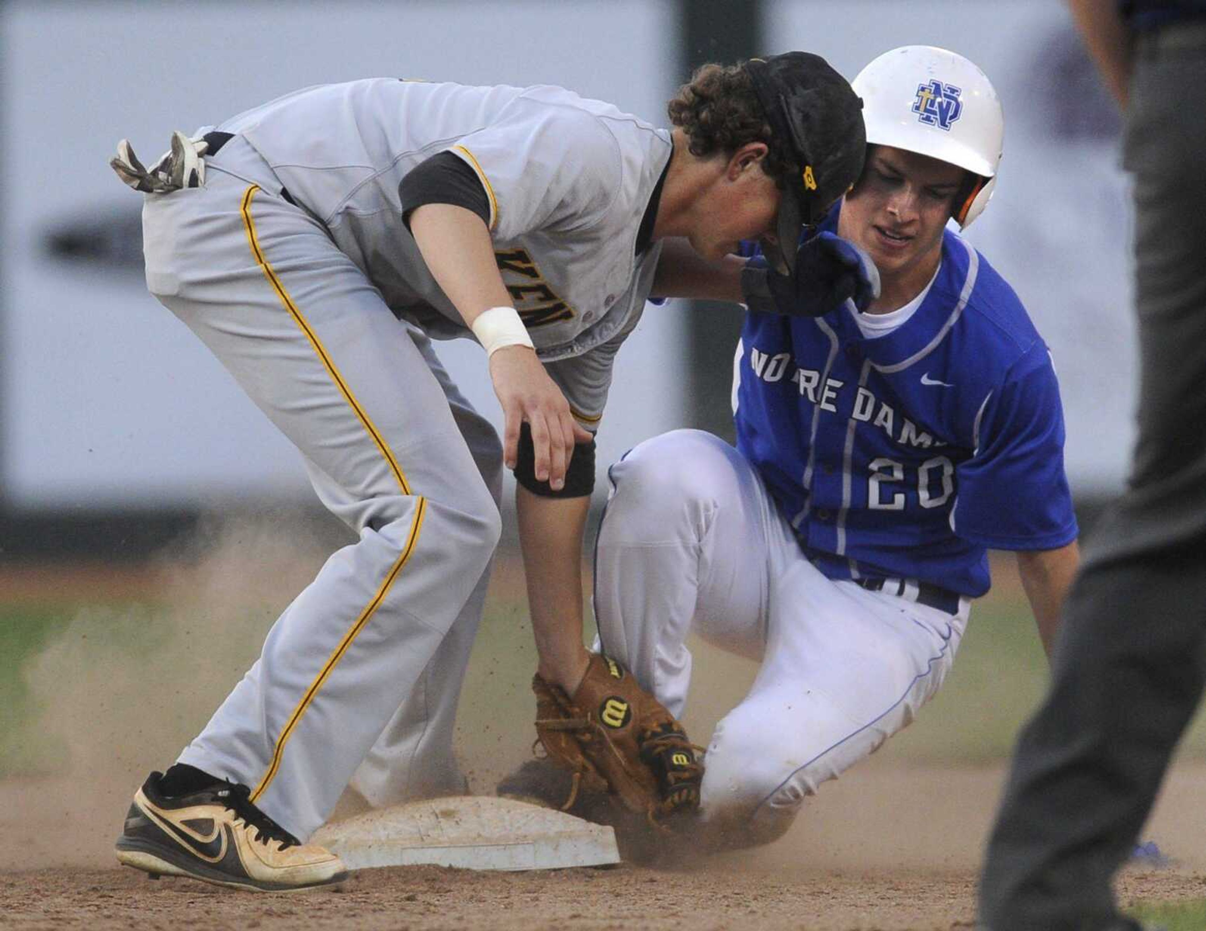 Notre Dame&#8217;s Chase Urhahn steals second base as Kennett second baseman Payton Burke applies the late tag during the first inning of the SEMO Conference championship game Monday at Capaha Field. Kennett won 7-5. (Fred Lynch)