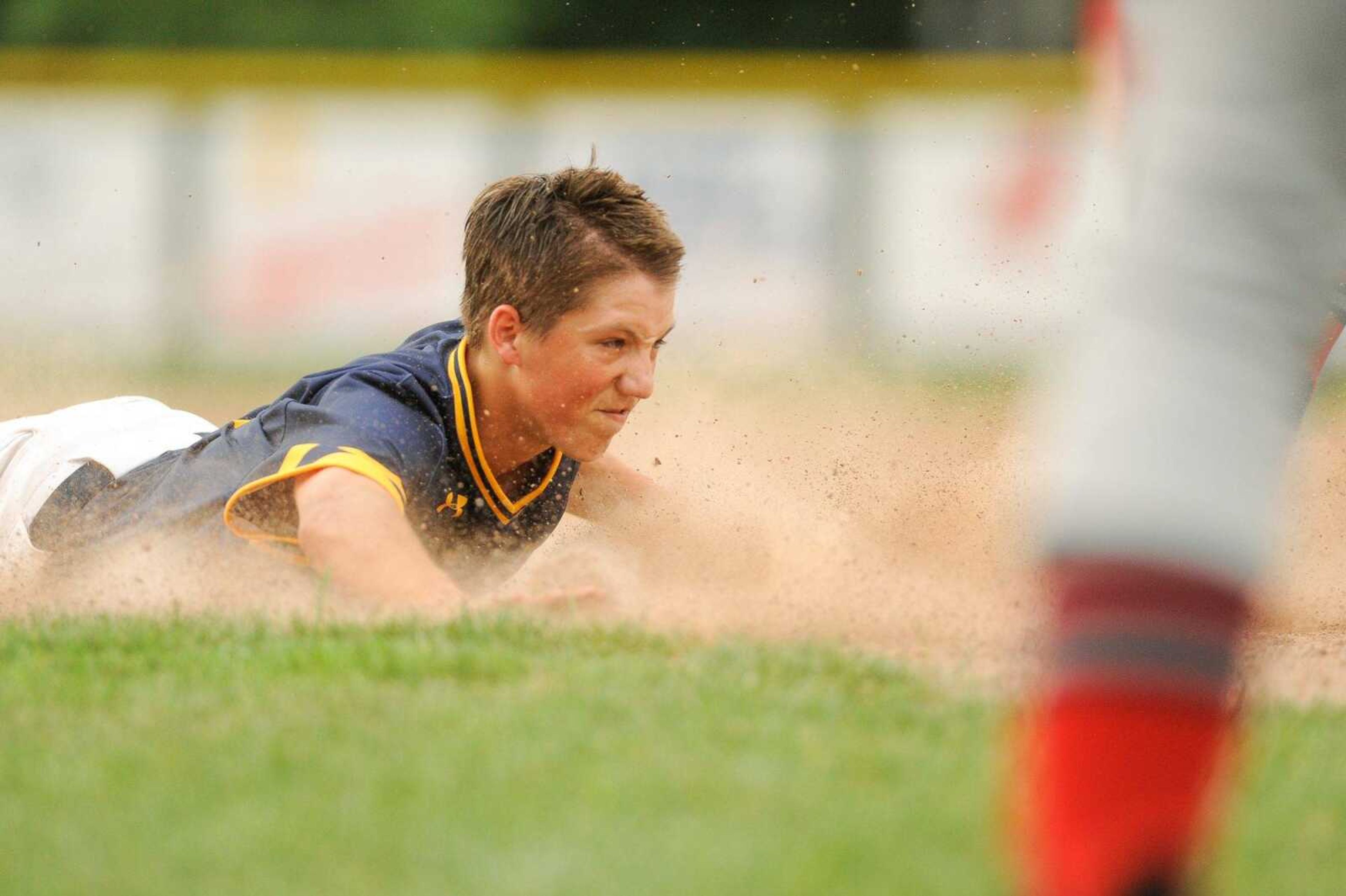 Cape Ford and Sons Post 63 Senior Legion's Brock Baugher slides into third base after hitting a triple in the fourth inning against Sikeston Post 114 Senior Legion Wednesday, June 17, 2015 at Capaha Field. (Glenn Landberg)