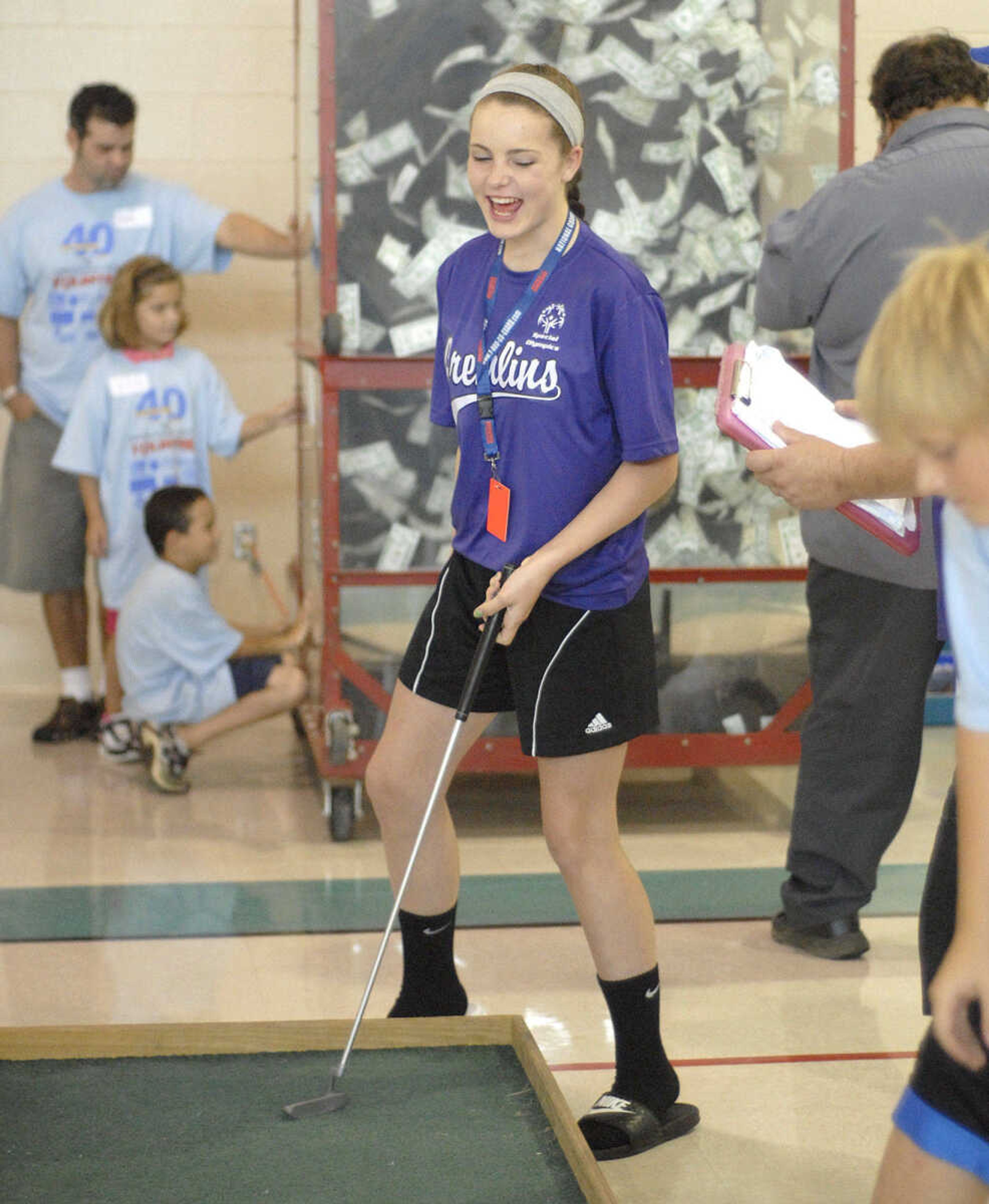 LAURA SIMON ~ lsimon@semissourian.com
Sierra Thibault of Union, Mo. reacts to her putt at Victory Village inside the the Osage Centre Saturday, August 13, 2011 in Cape Girardeau.