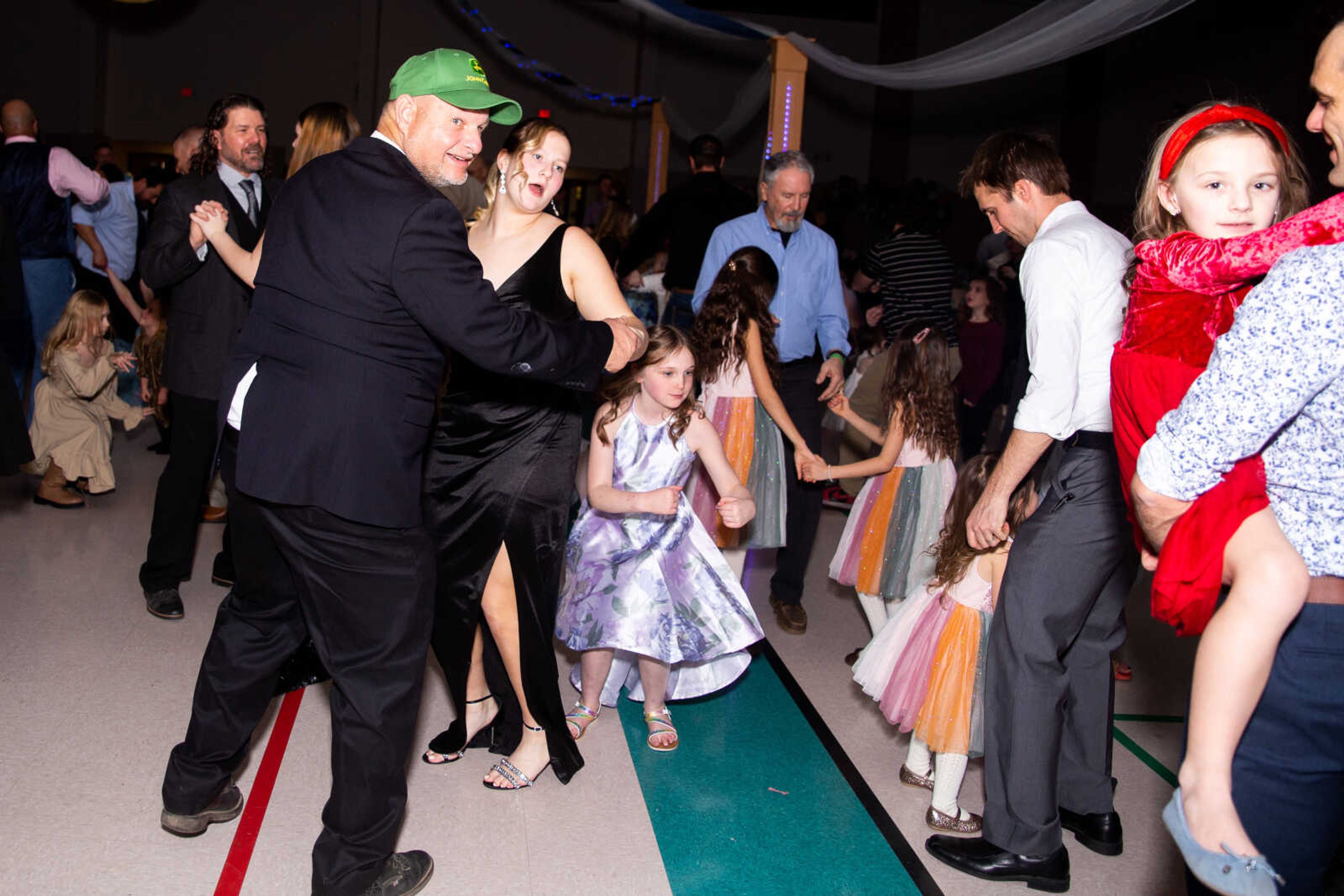 Charlie Cox dances with his daughter Marybeth Cox, 17, at the dance.