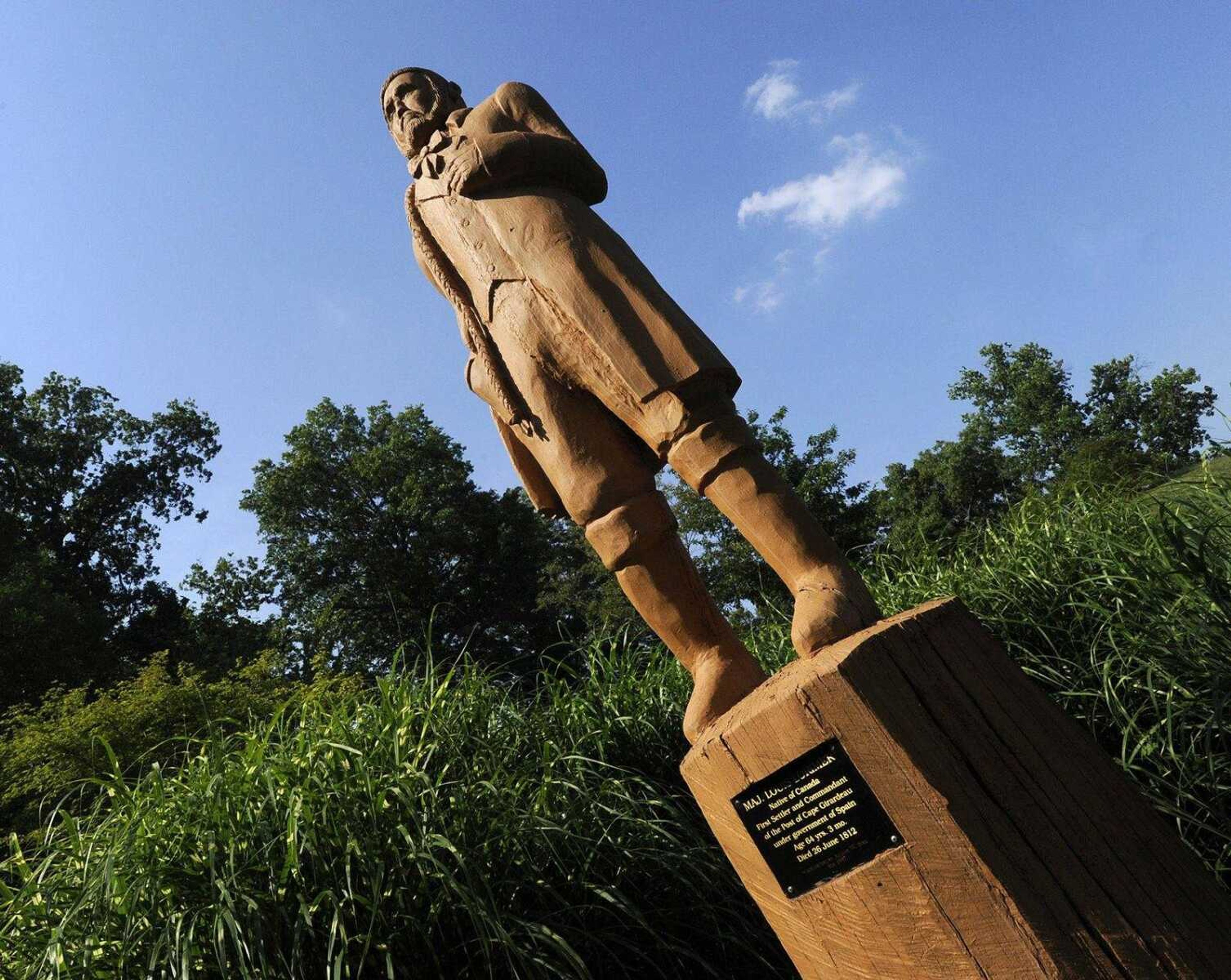 August W. Birk carved this statue of  Maj. Louis Lorimier on a tree stump at Cape Rock Park in September 1997. (Fred Lynch)