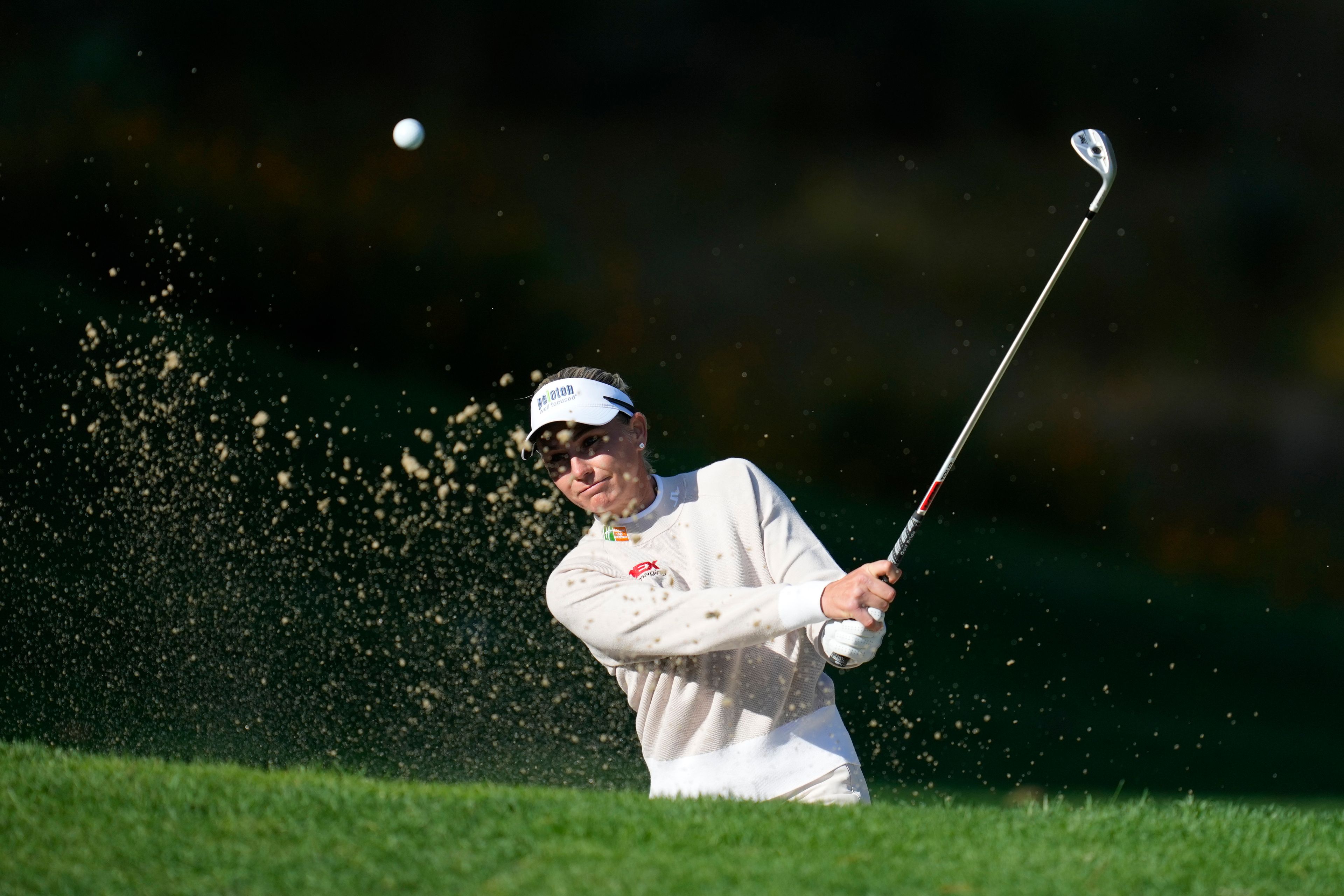 Ryann O'Toole of the United States hits out of a bunker on the 14th green during the final round of the LPGA Ladies Championship golf tournament at the Seowon Valley Country Club in Paju, South Korea, Sunday, Oct. 20, 2024. (AP Photo/Lee Jin-man)