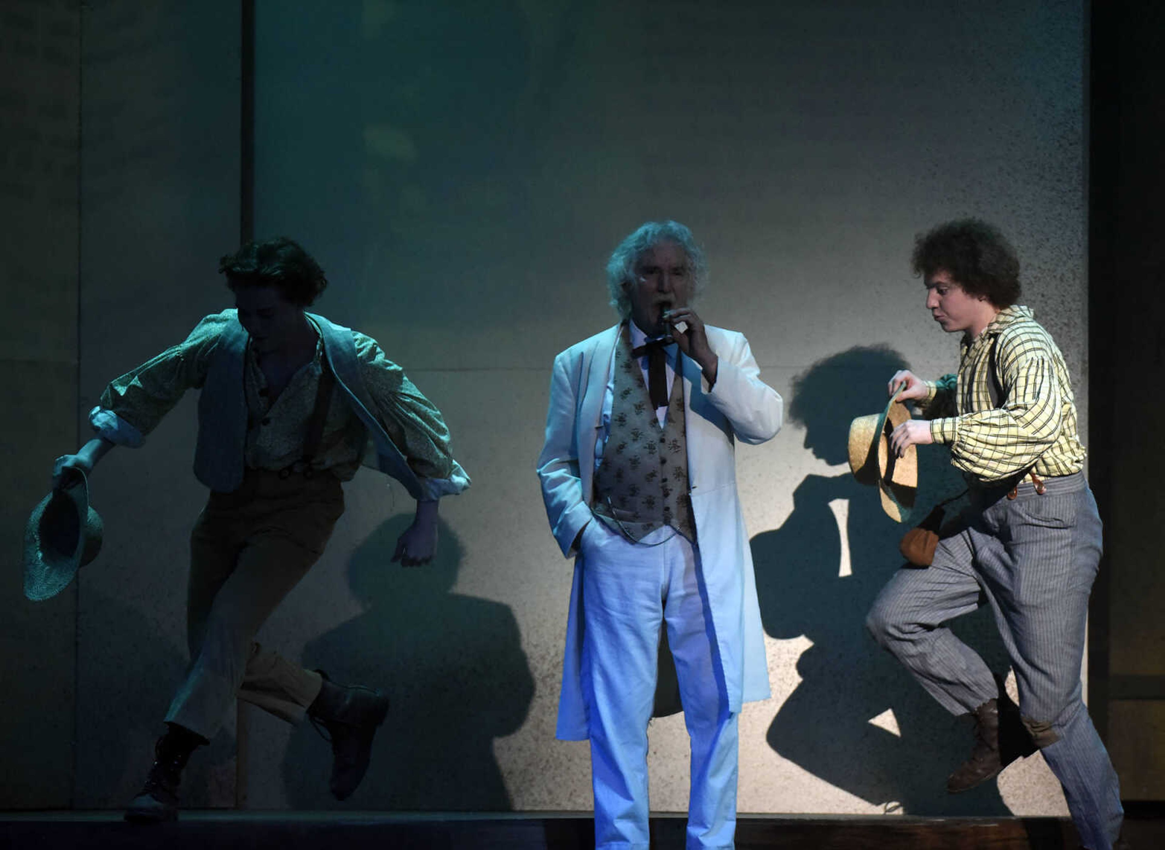 Mark Twain, portrayed by Lester Goodin, mulls about the stage as Tom Sawyer, left, played by Adam Schween, and Huckleberry Finn, played by Nicholas Kuchem, run around him during The Conservatory of Theatre and Dance's production of "Big River: The Adventures of Huckleberry Finn" on Wednesday, Feb. 22, 2017, at Southeast Missouri State University's River Campus. The show runs through Sunday.