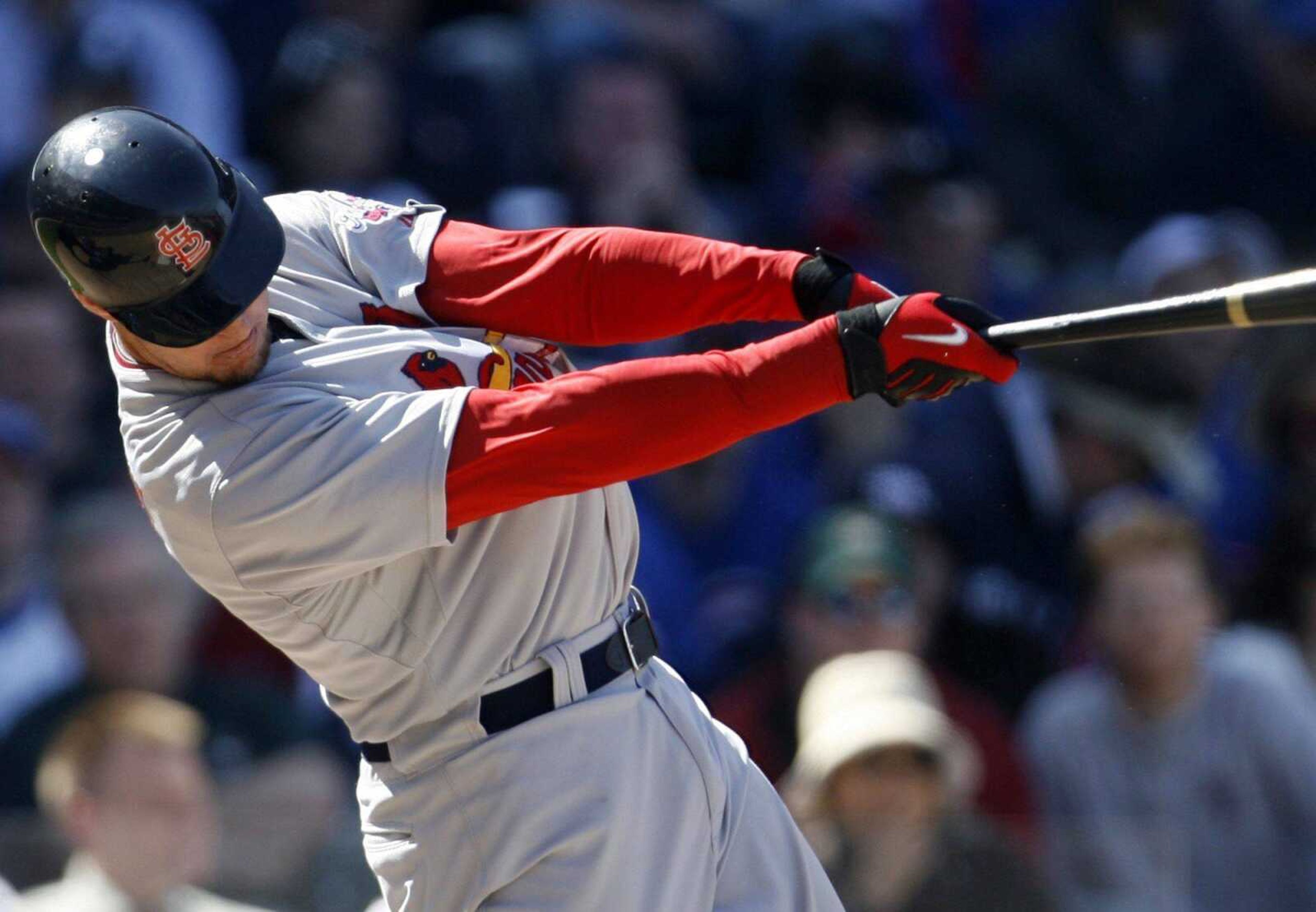 St. Louis Cardinals' Ryan Ludwick connects for a solo home run during the seventh inning of a baseball game against the Chicago Cubs, Friday, April 17, 2009, in Chicago.(AP Photo/Nam Y. Huh)