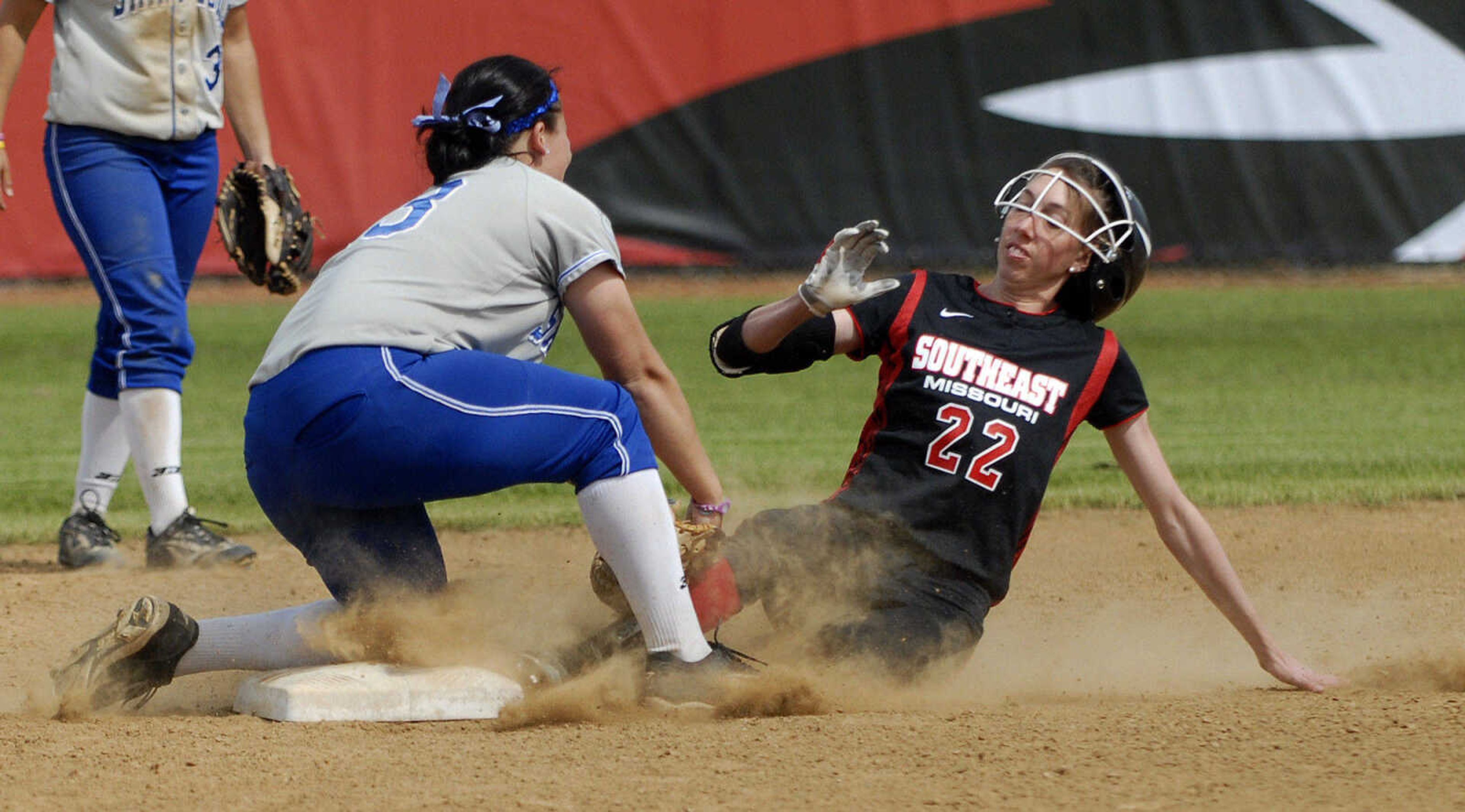 LAURA SIMON~lsimon@semissourian.com
Saint Louis University's Jessica Van Nostrand tags out Southeast base runner Cheyenne Gipson at second in the second inning of the first game of a double-header Wednesday, May 4, 2011 at the Southeast Softball Complex.