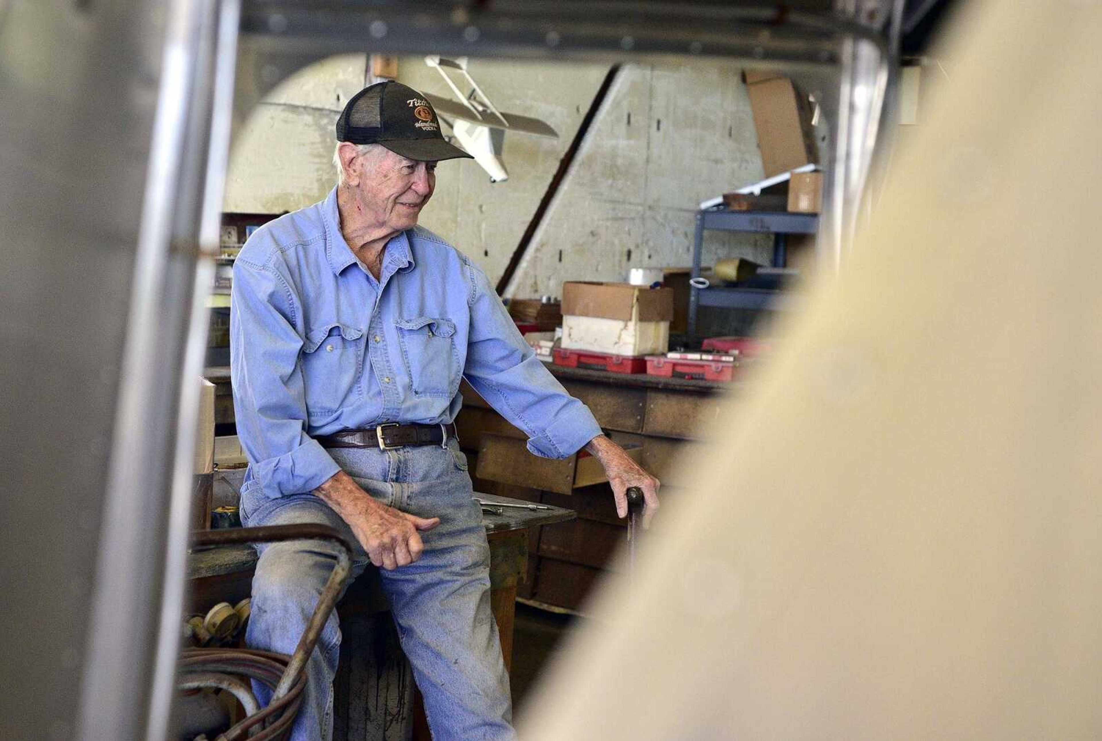 John Farquhar, or known to most as "Papa John" spends most of his days tinkering inside the hangar that houses Cape Copters at the Cape Girardeau Regional Airport.