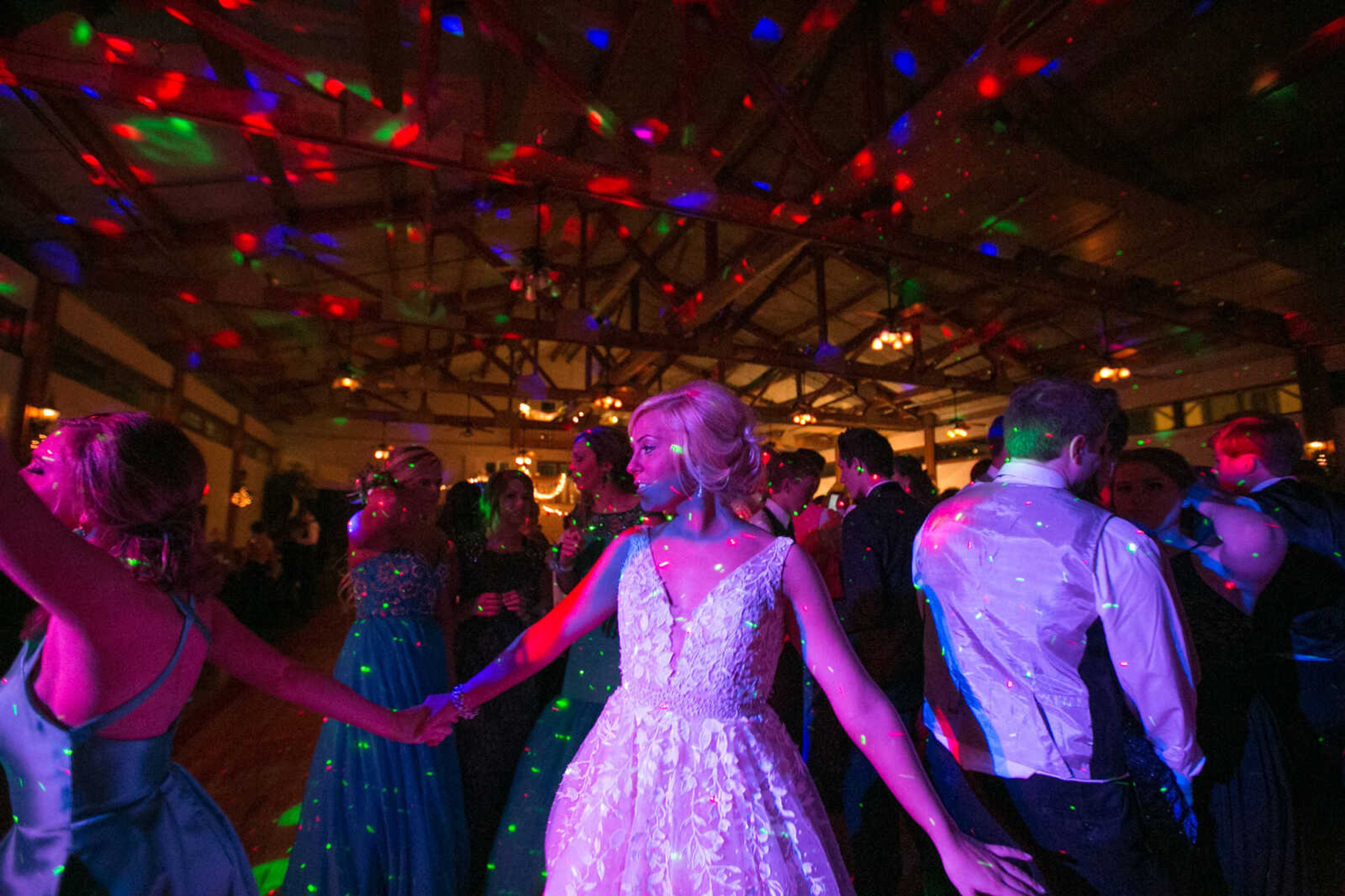 GLENN LANDBERG ~ glandberg@semissourian.com

Students take to the dance floor during the Notre Dame Regional High School prom, "Red Carpet Gala," Friday, April 29, 2016 at Bavarian Halle in Jackson.