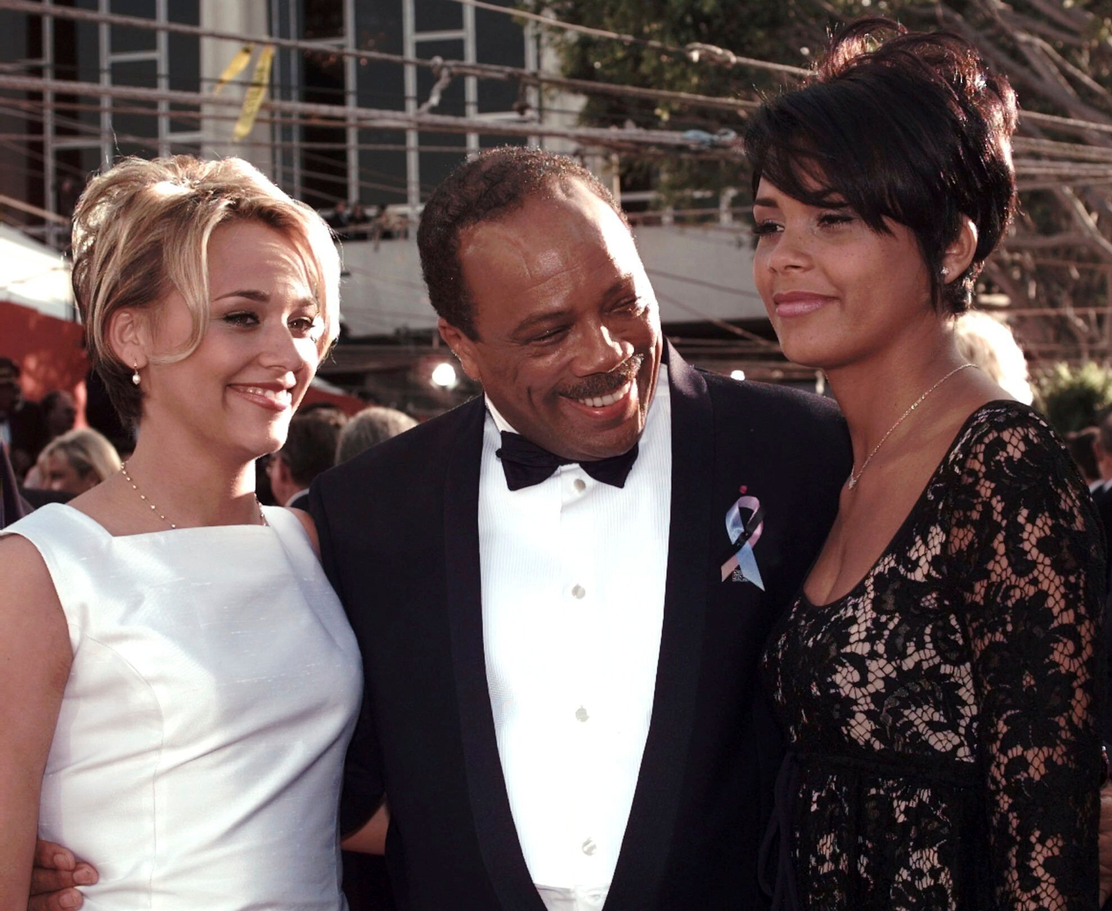 FILE - Quincy Jones, center, poses with his daughters Rashida, left and Kidada as they arrive at the 68th Annual Academy Awards in Los Angeles, Monday, March 25, 1996. Quincy Jones died at age 91. (AP Photo/Mark Terrill, File)