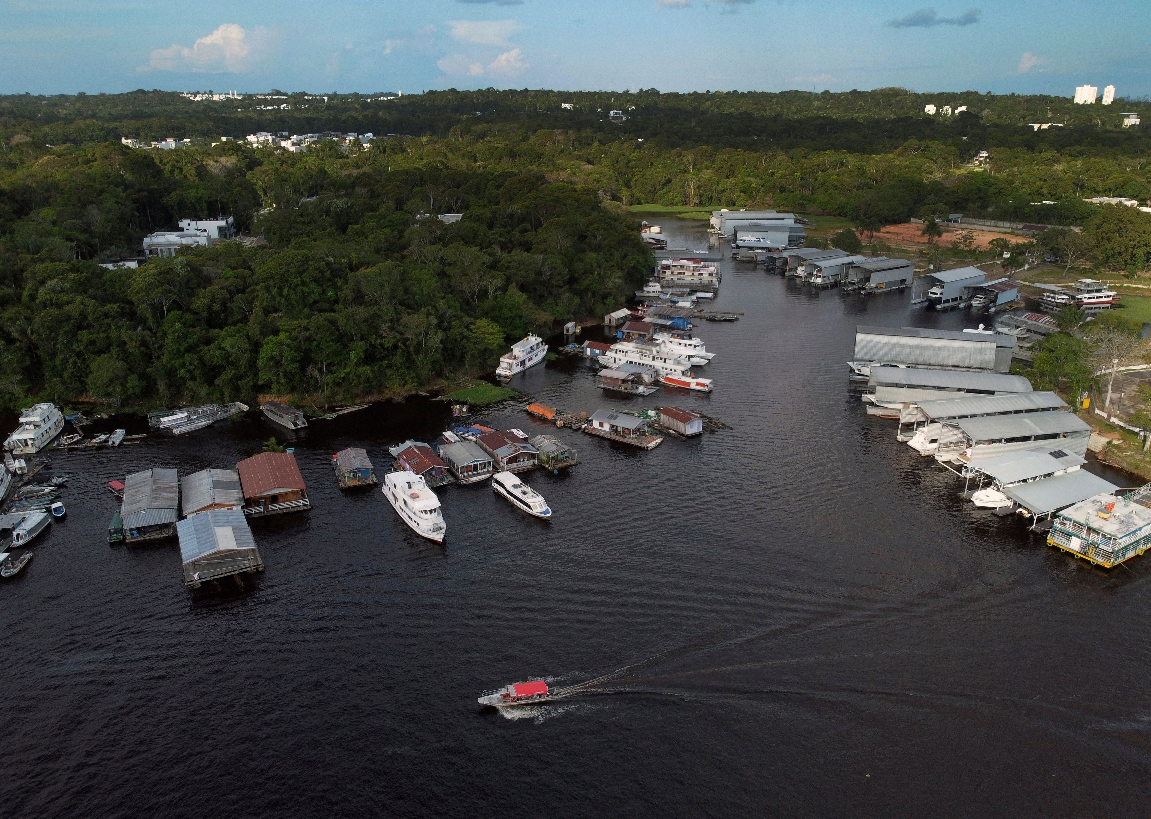 The Taruma Acu River is visible in Manaus, state of Amazonas, Brazil, Friday, July 5, 2024. (AP Photo/Edmar Barros)