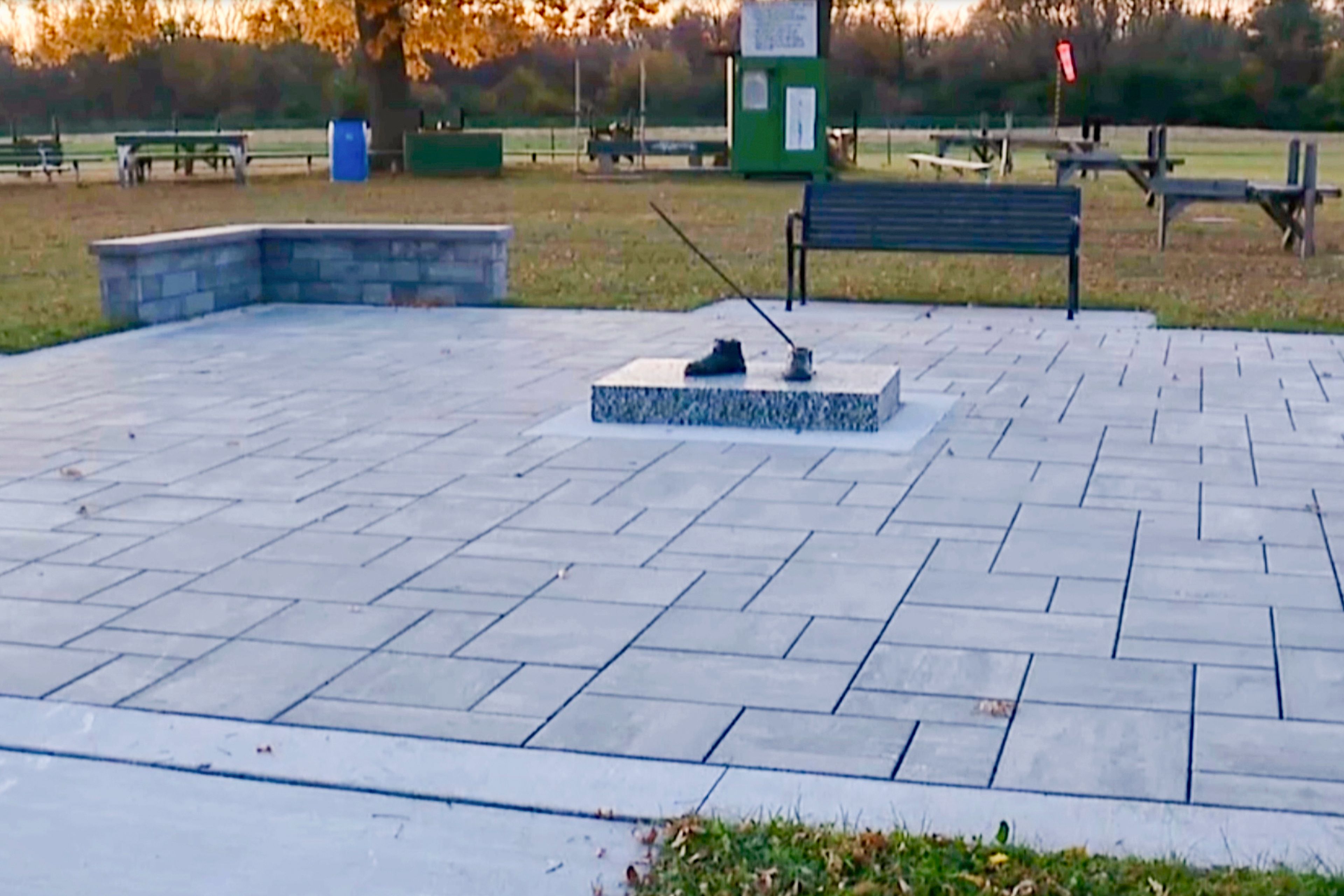 In this image taken from a video provided by WXYZ, only the feet are left of a 600-pound bronze statue of a Tuskegee airman after it was stolen from a city park in Detroit on Friday, October 24, 2024. (WXYZ via AP)