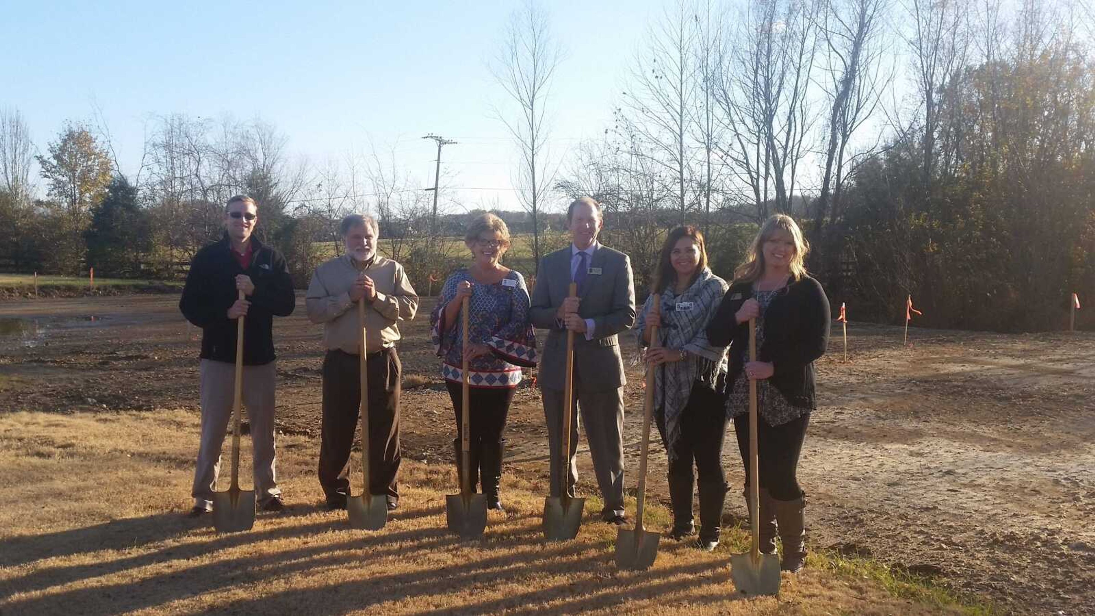 From left, Jeff Branch, Mike Landawee, Megan Steimle, Clay Crosson, Morgan Beasley and Mary Eaves break ground on an expansion of Capetown Independent Living.