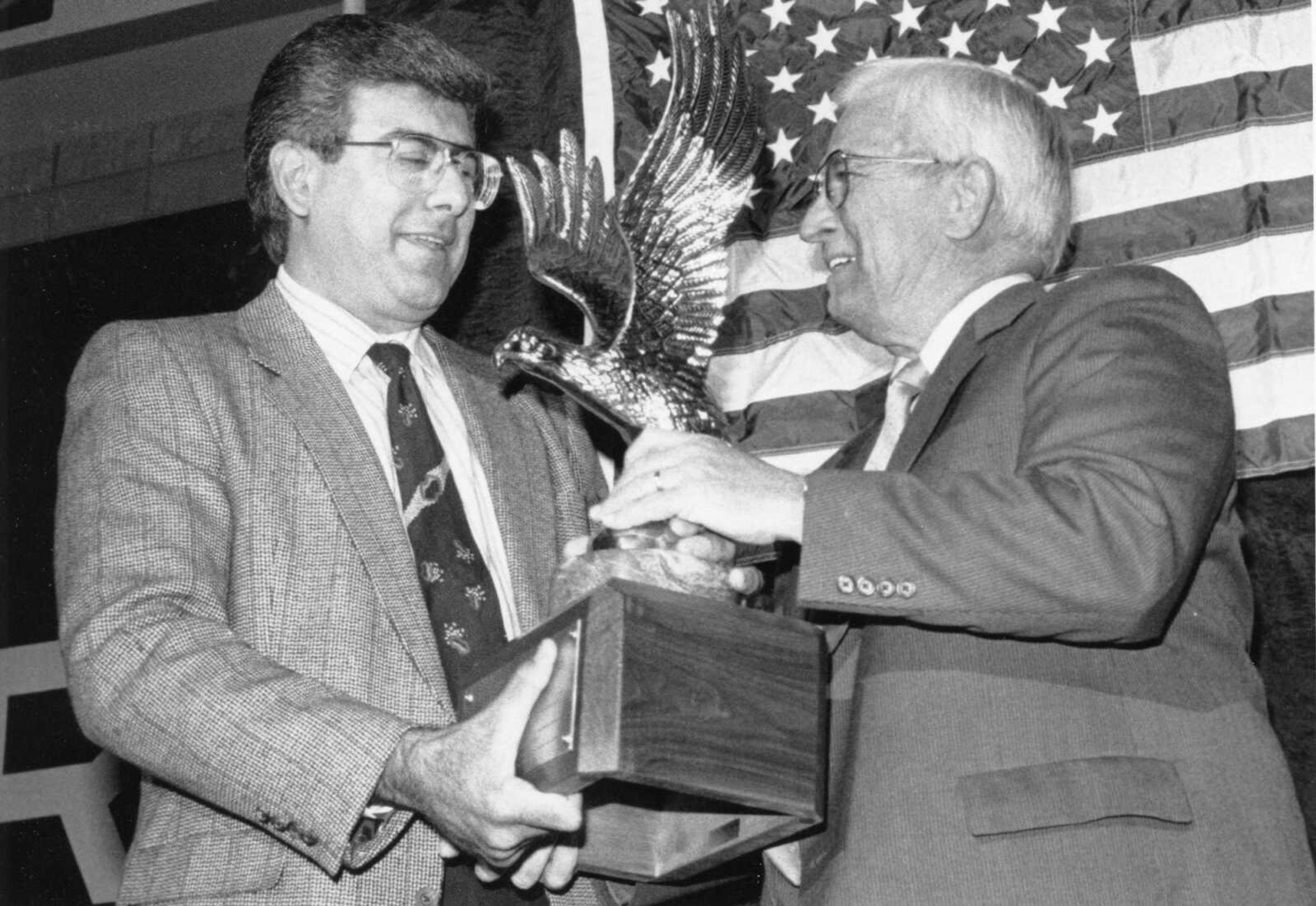 Published Oct. 6, 1989.
The Industrial Relations Council of the Cape Girardeau Chamber of Commerce sponsored its annual Industrial Appreciation Dinner at the Show Me Center. Ed Cole with Dana Corporation delivered the keynote address. The Commitment to Excellence Award was presented to Lone Star Industries, Inc. Here, Harry Phillip, left, manager of the Cape Girardeau facility, received the award from chamber president Bob Hendrix. (Southeast Missourian archive)