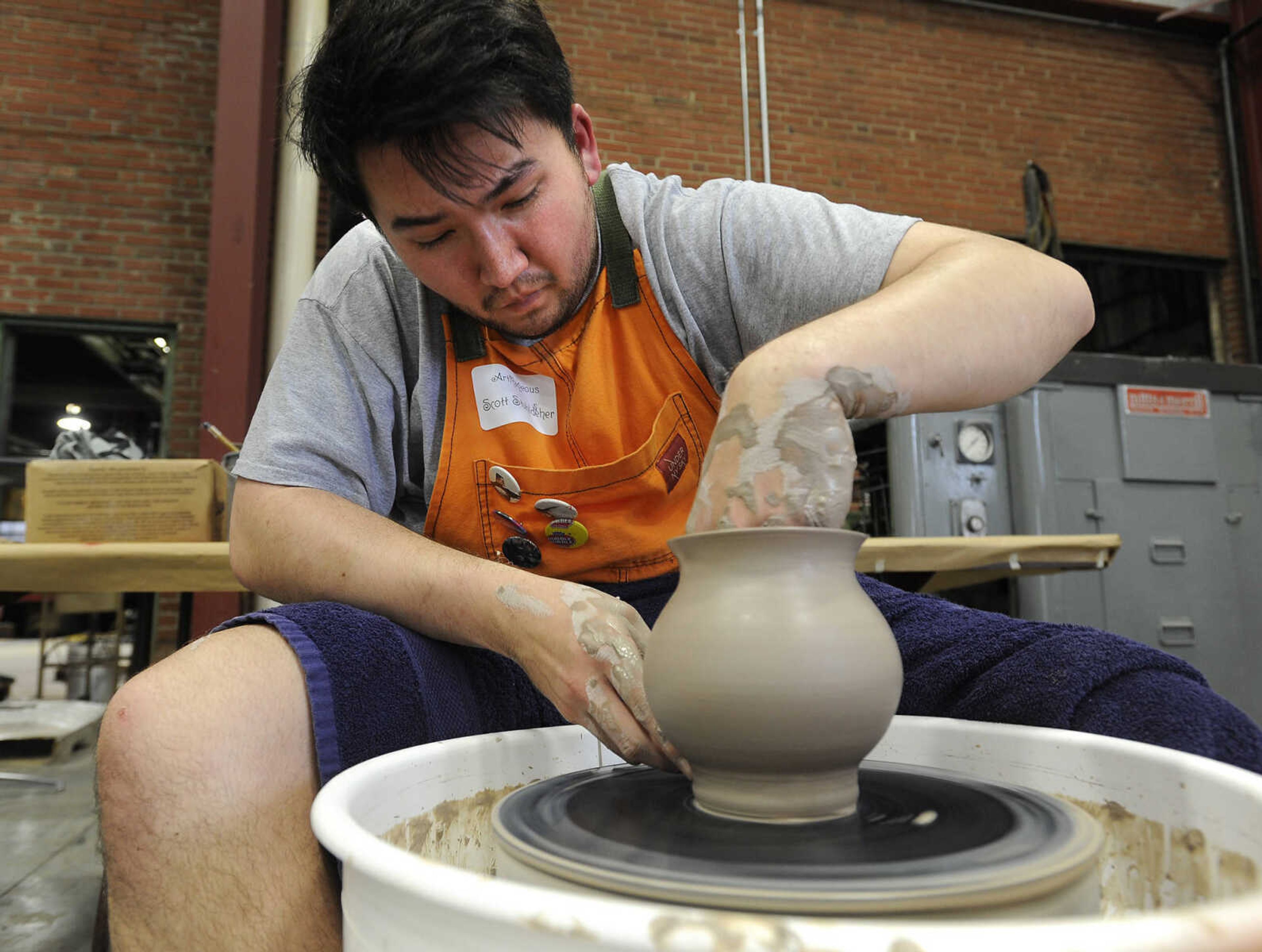 FRED LYNCH ~ flynch@semissourian.com
Scott Stuhldreher makes a clay vase on on pottery wheel Thursday, April 20, 2017 during ARTrageous at Erlbacher Gear and Machine Works in Cape Girardeau.