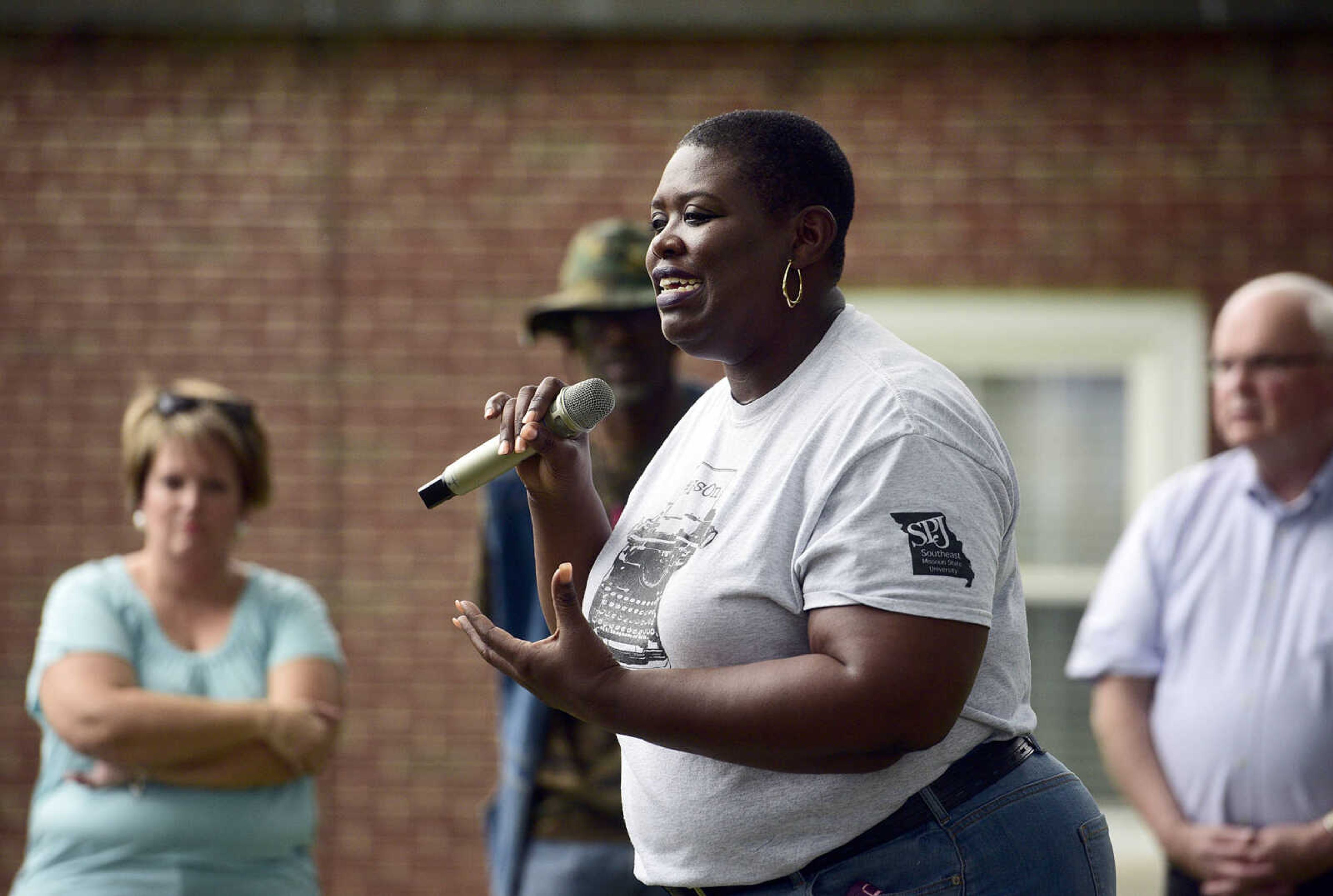 Dr. Tamara Zellars Buck speaks during the Love, Not Hate rally on Sunday evening, Aug. 13, 2017, at Ivers Square in Cape Girardeau.