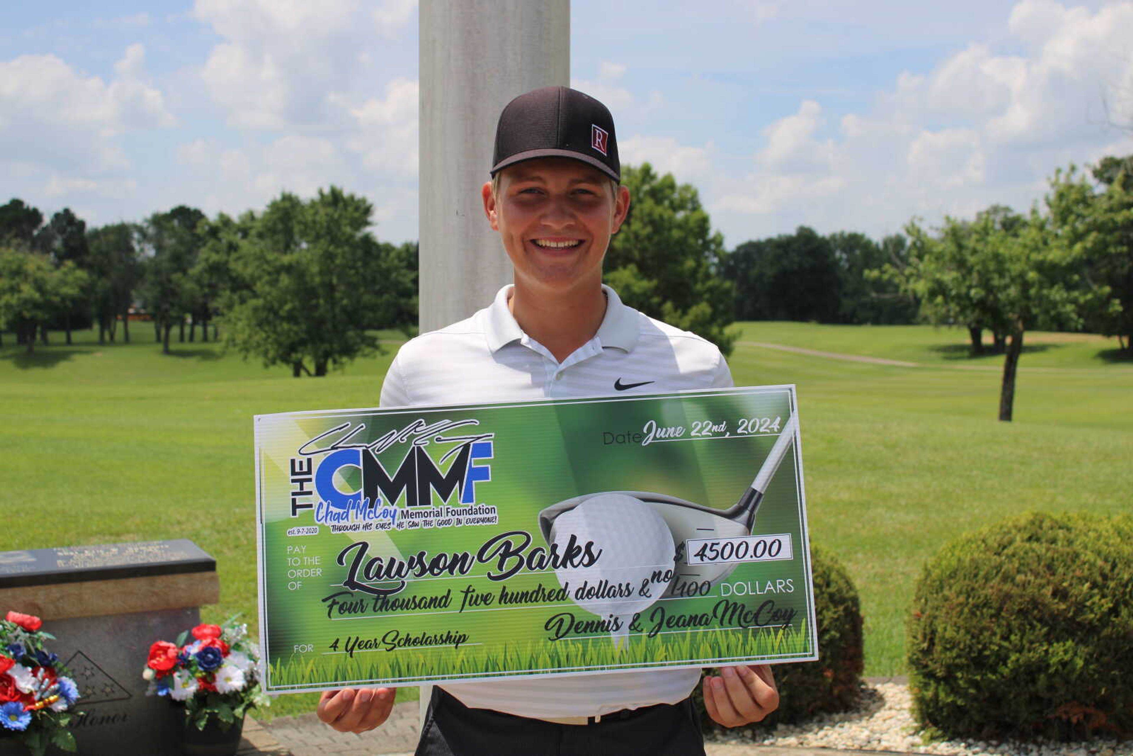 Recent Poplar Bluff High School graduate Lawson Barks receives the Chad McCoy Memorial Foundation scholarship on Thursday at Ozark Ridge Golf Course.