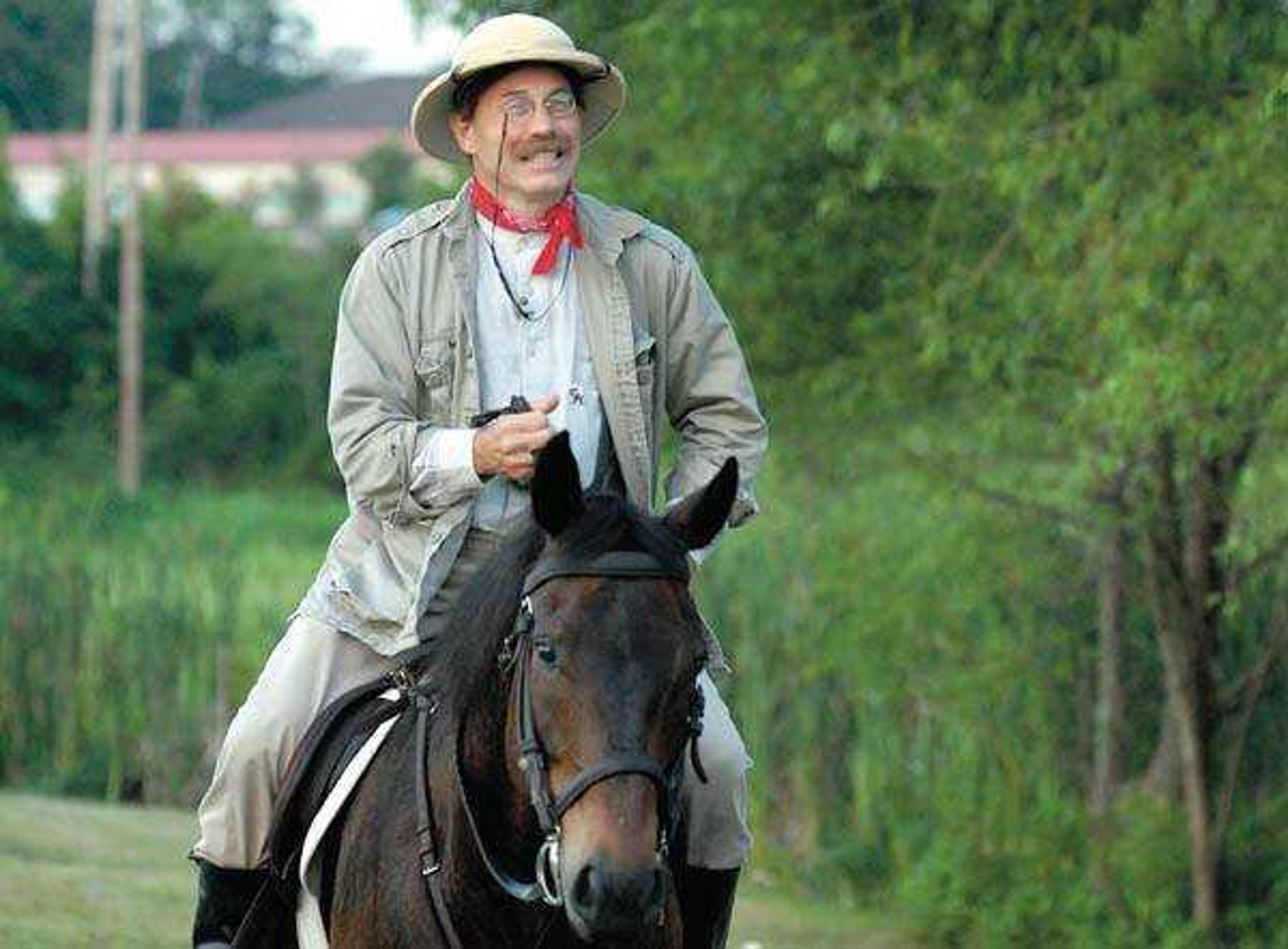 TUESDAY: In historical fashion, Theodore Roosevelt, played by Doug Mishler, arrived on horseback for his performance as part of Tuesday's Chautauqua.