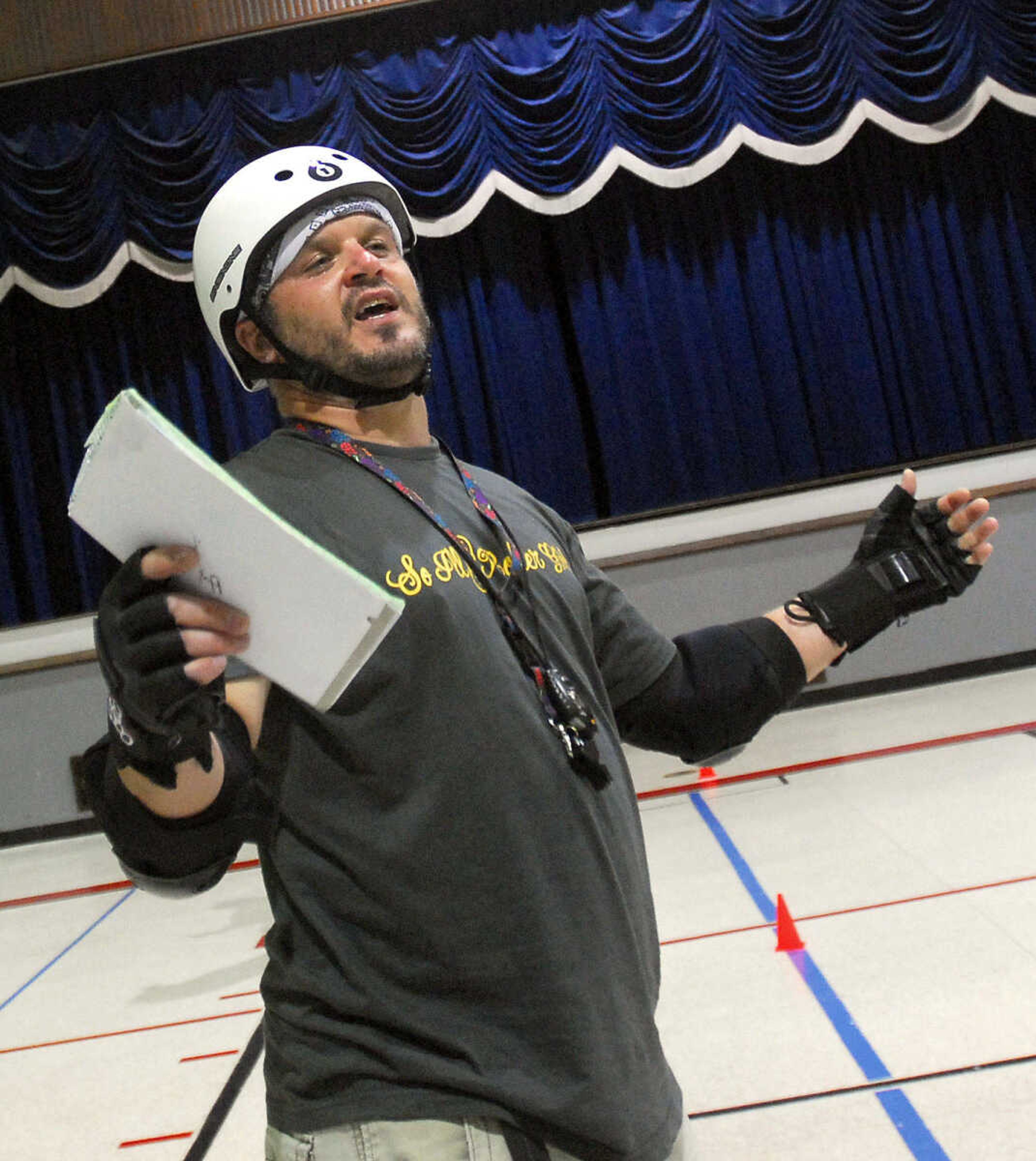 LAURA SIMON~lsimon@semissourian.com
Ron "Jolly Dodge-Her" Ruppel runs drills with the Cape Girardeau Roller Girls Monday, May 25, 2010 at the A.C. Brase Arena Building.