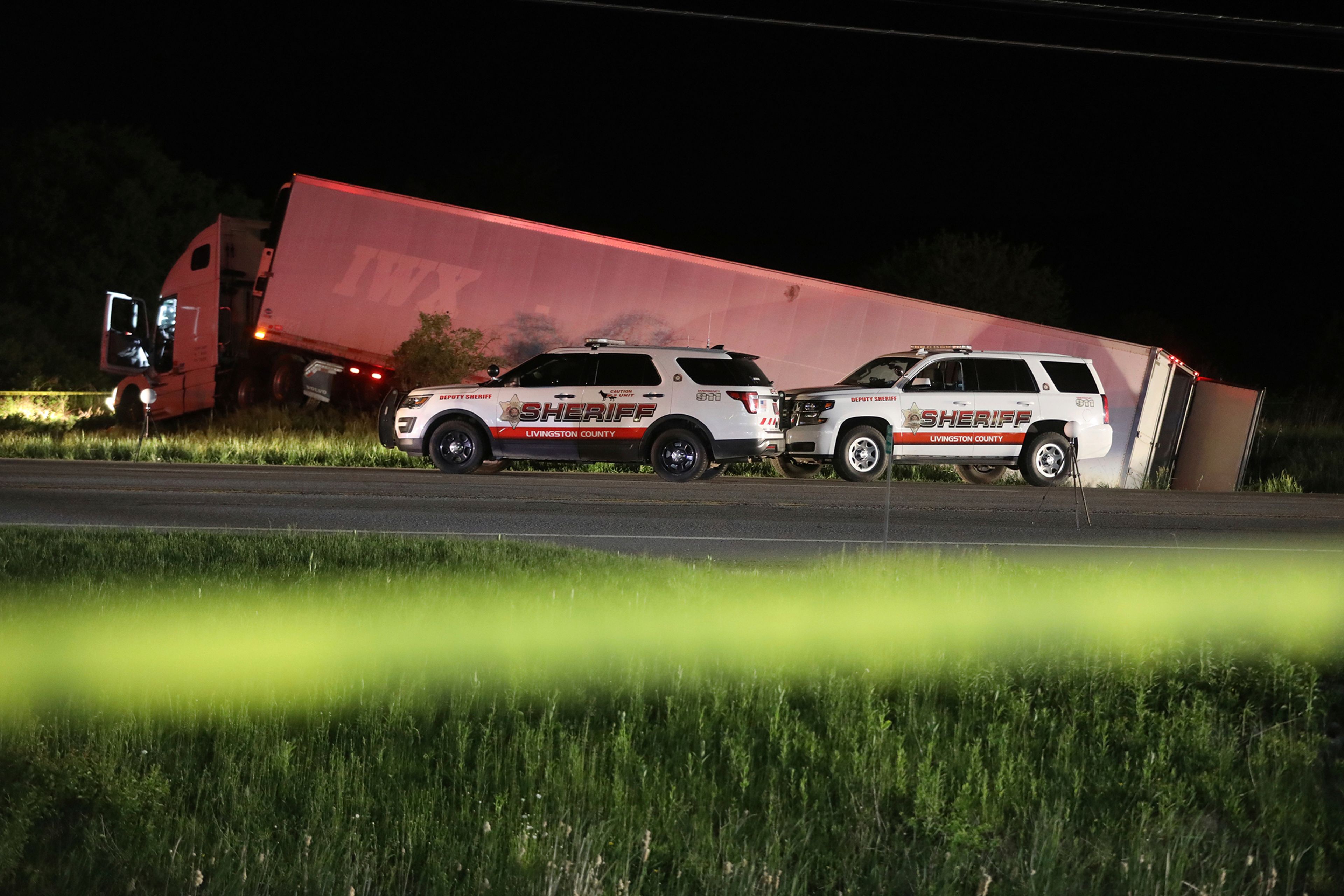 The Livingston County Sheriff’s Office works at the scene of a tractor trailer after driver Joshua Blessed was killed during a shootout with law enforcement officers on Rt. 20A in Geneseo, N.Y., on Thursday, May 28, 2020. The incident started in LeRoy, N.Y., when police stopped the tractor trailer for speeding. Blessed took off and drove into Livingston County, leading law enforcement on a chase. (Tina MacIntyre-Yee/Democrat & Chronicle via AP, File)