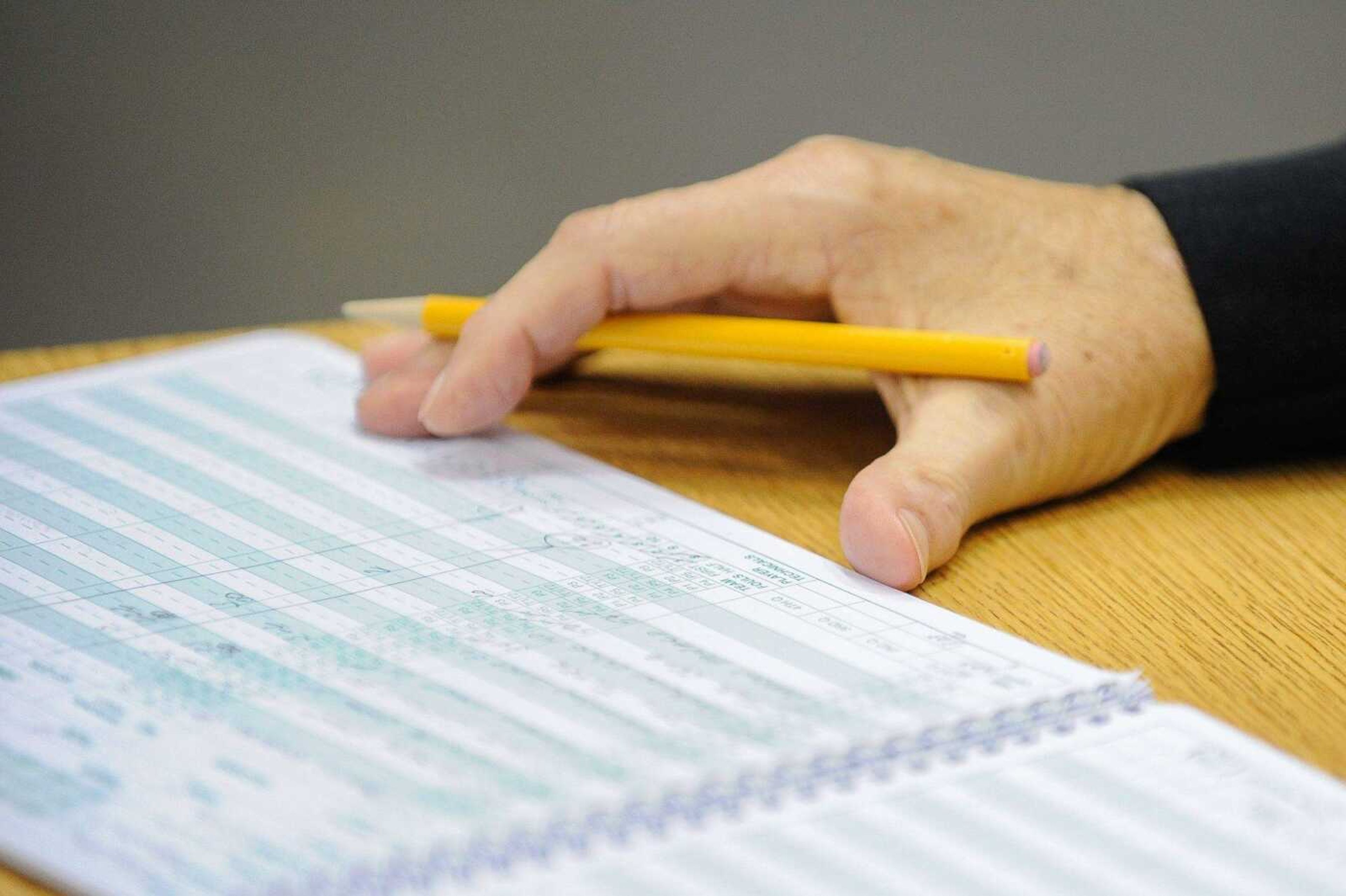 Tyler keeps score for Scott County Central during a championship quarterfinal of the Southeast Missourian Christmas Tournament on Saturday at the Show Me Center. (Glenn Landberg)