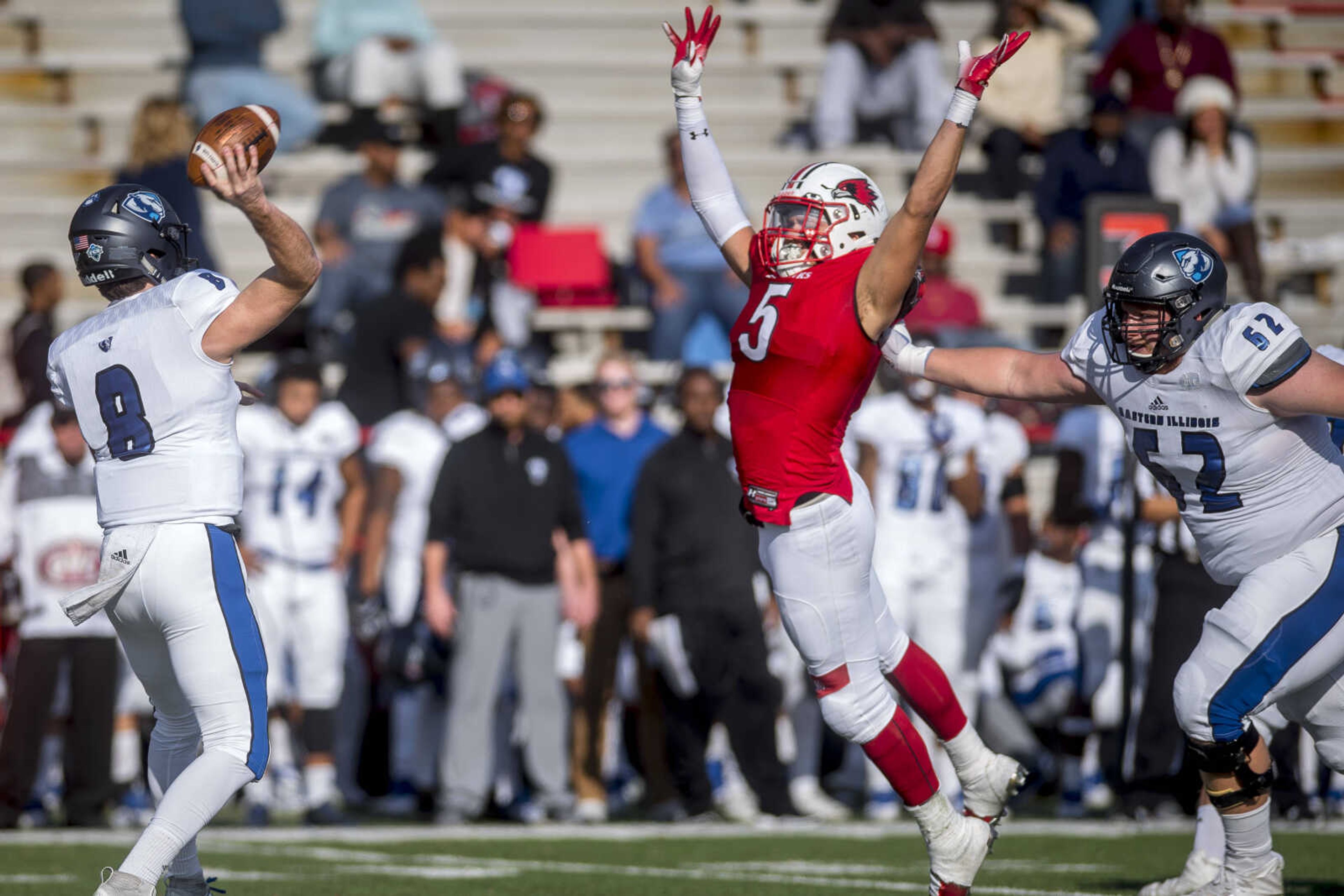 Southeast linebacker Zach Hall leaps to block a pass during the Redhawks' final home game of the season Saturday.