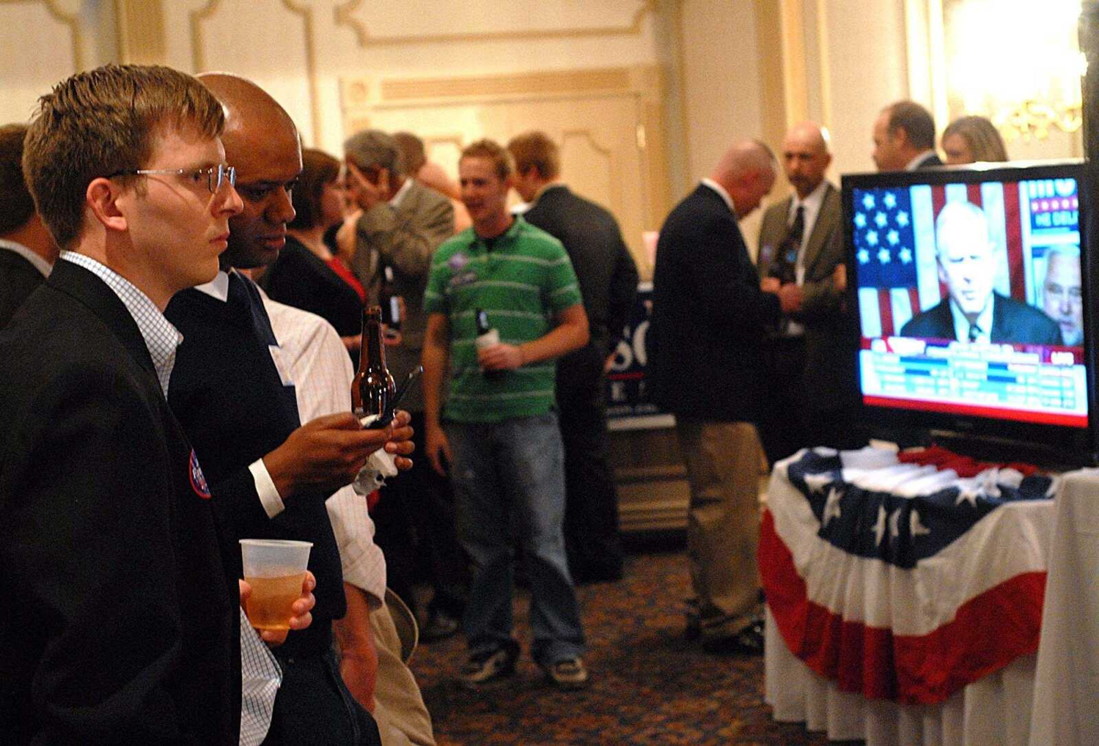 AARON EISENHAUER ~ aeisenhauer@semissourian.com
Republican supporters watch election results on two televisions at the Jo Ann Emerson watch party.