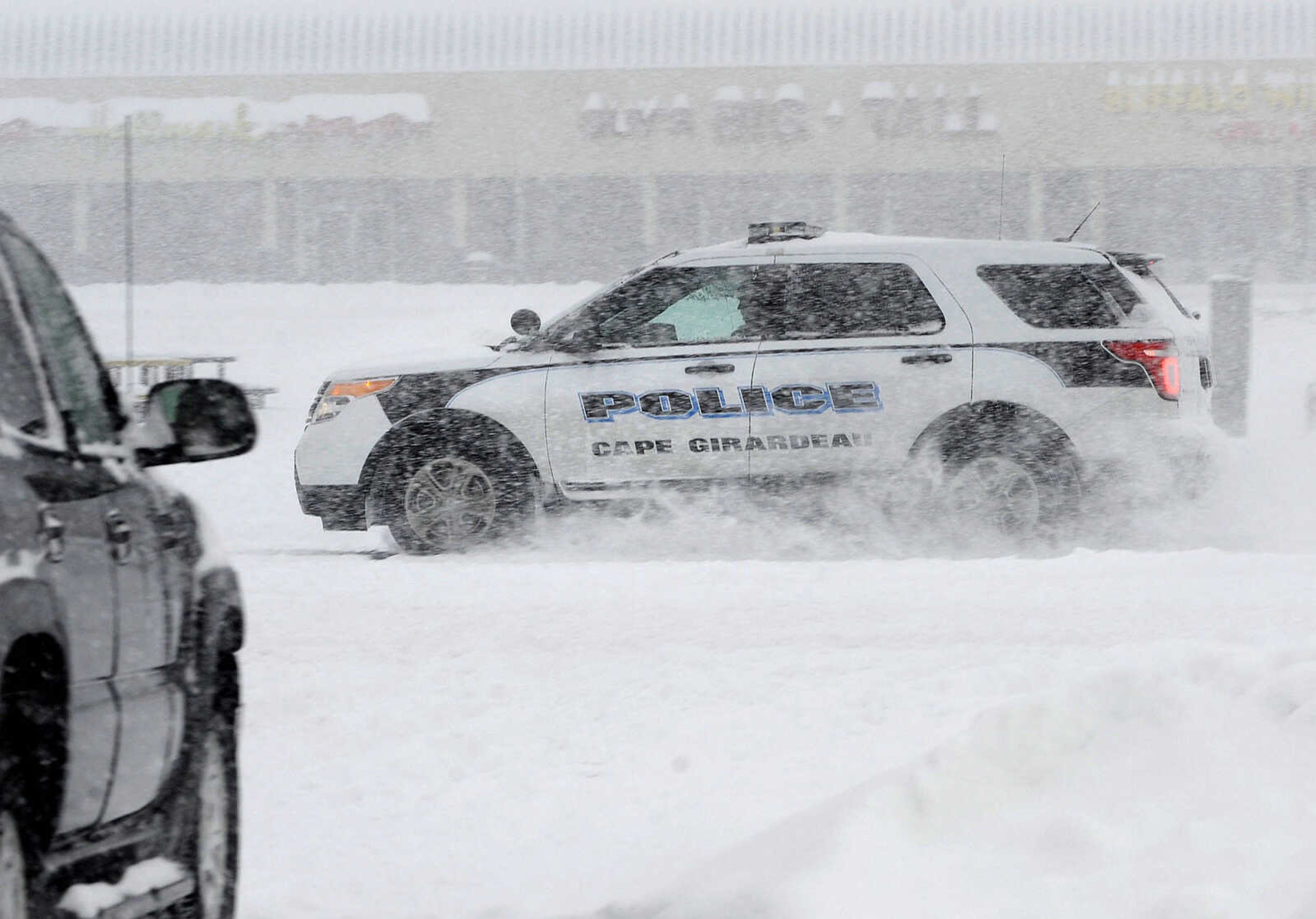 FRED LYNCH ~ flynch@semissourian.com
A police officer patrols along William Street Monday morning, Feb. 16, 2015 in Cape Girardeau.