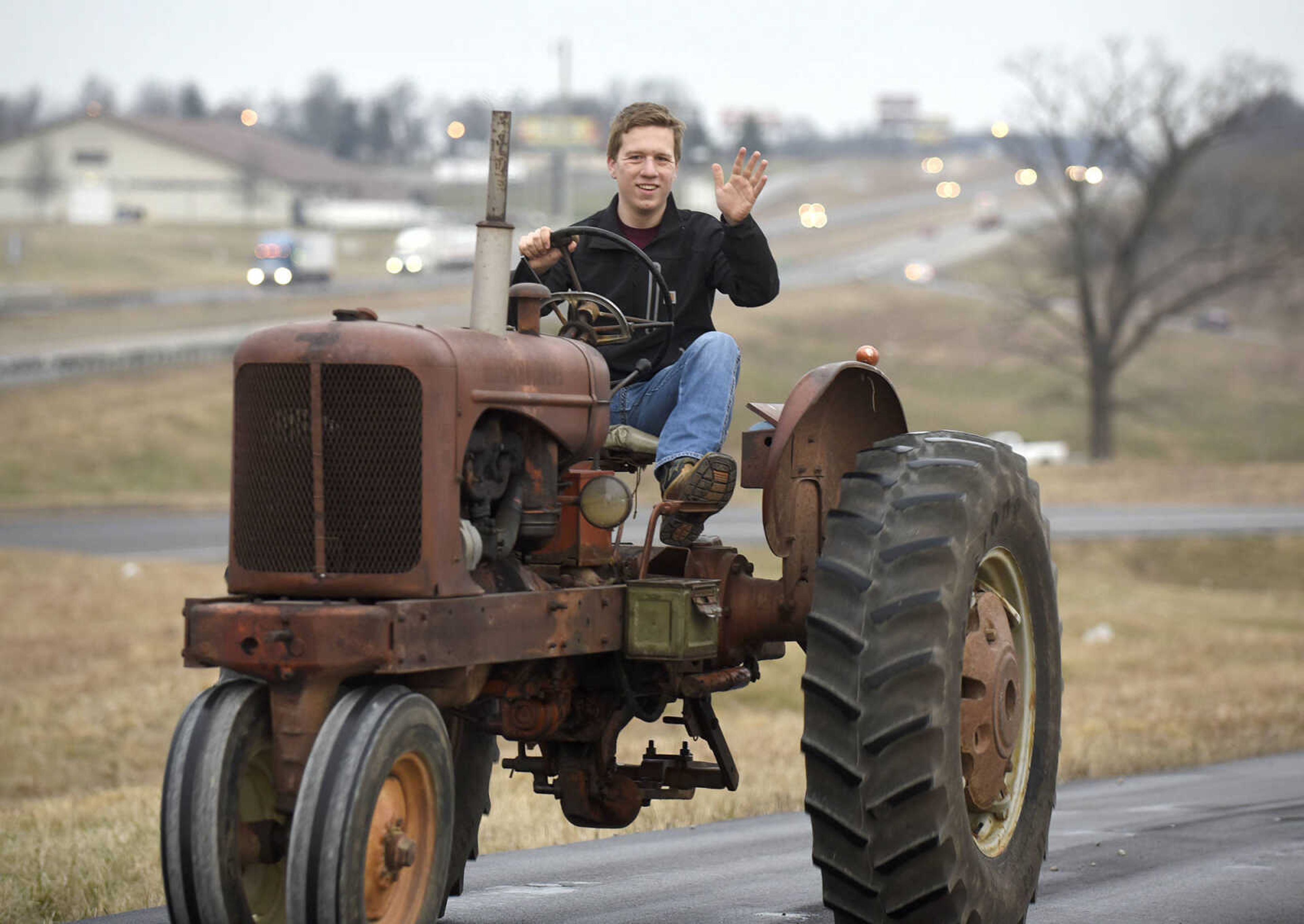 Saxony Lutheran High School FFA students take to the road on their tractors during drive your tractor to school day on Tuesday morning, Feb. 21, 2017. Students began their journey to school from Davis Farm Supply on Highway 61 in Jackson as part of FFA Week.