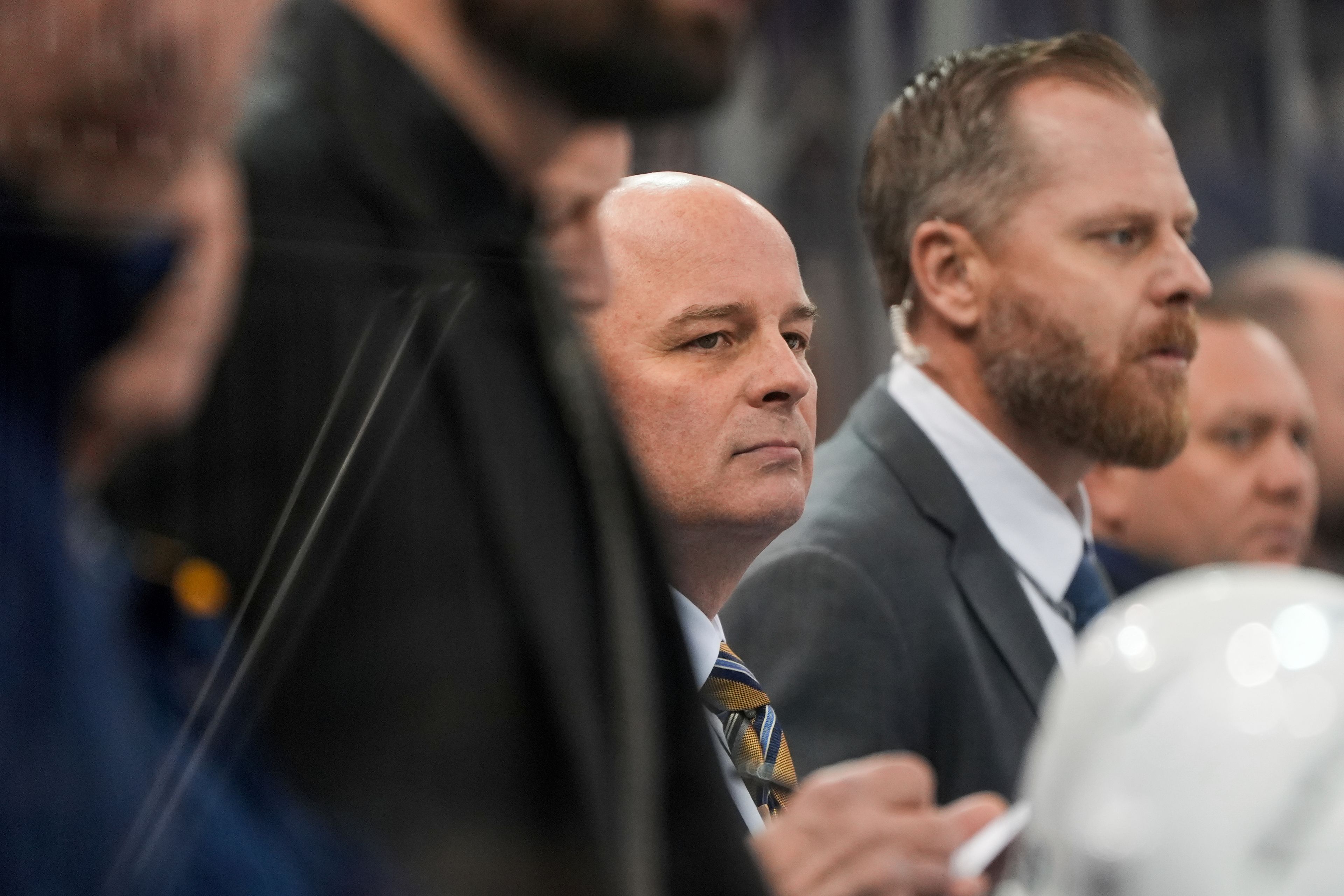 St. Louis Blues head coach Jim Montgomery, center, looks on during the first period of an NHL hockey game against the New York Rangers, Monday, Nov. 25, 2024, in New York. (AP Photo/Julia Demaree Nikhinson)