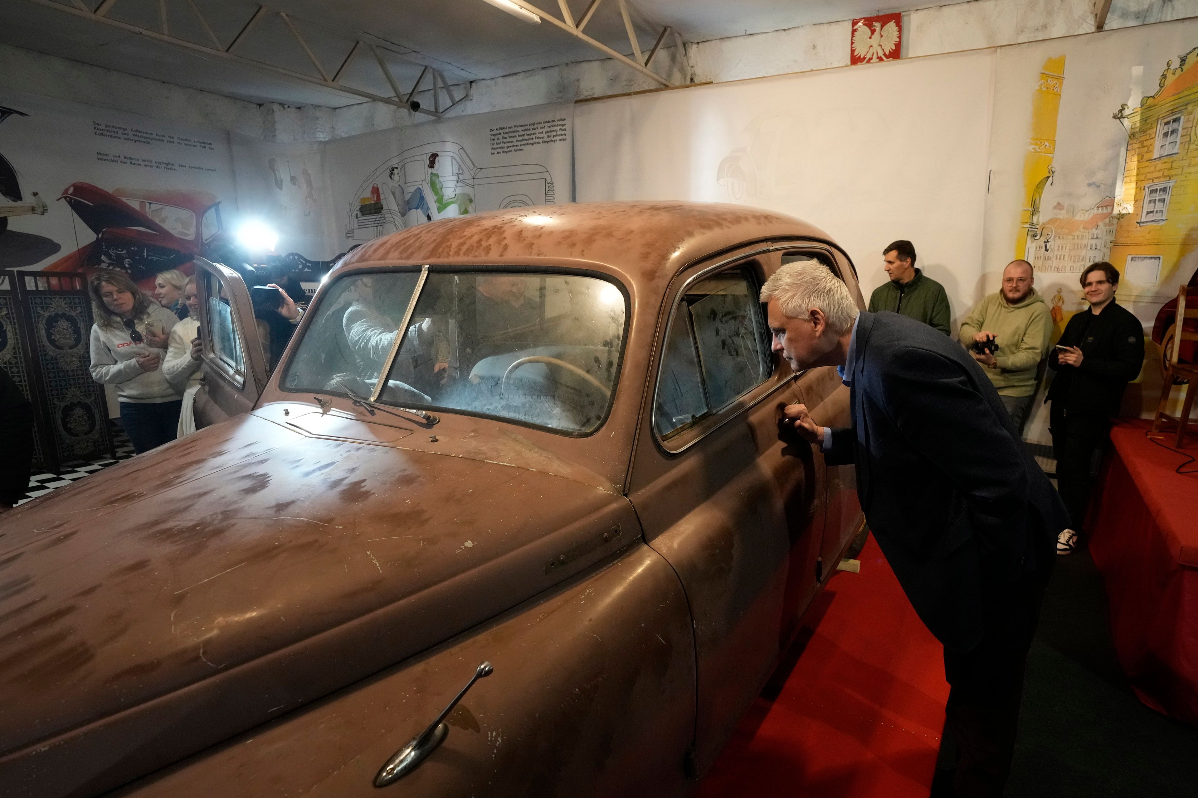 This Warszawa M-20 car with serial number 000001, based on a Soviet Union's model, was the first vehicle to leave a car factory in Poland after World War II, on Nov. 6, 1951 and now, 73 years later, it goes on public display at a private museum in Otrebusy, central Poland, on Wednesday, Nov. 6, 2024. (AP Photo/Czarek Sokolowski)