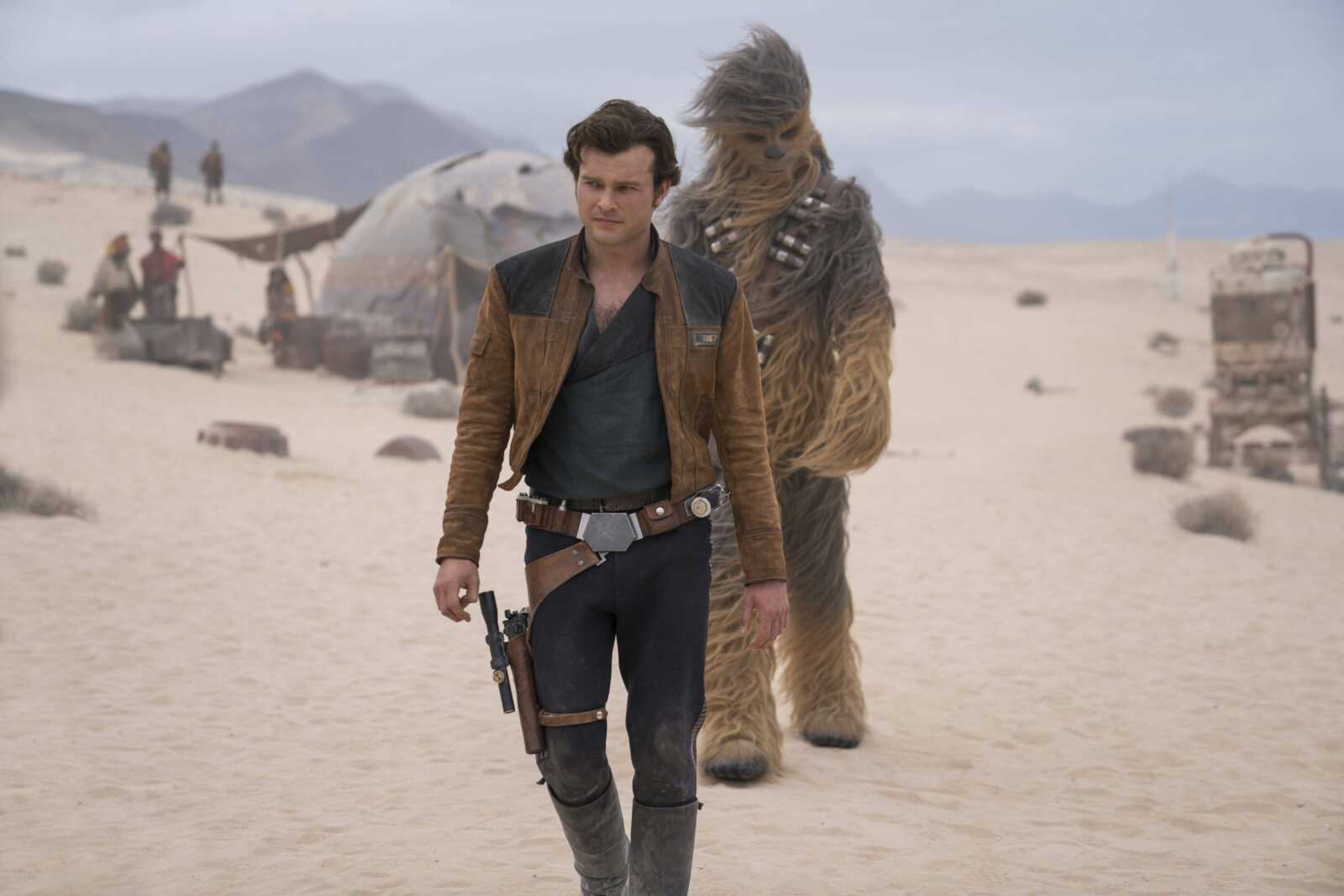 This image released by Lucasfilm shows Alden Ehrenreich and Joonas Suotamo in a scene from "Solo: A Star Wars Story."