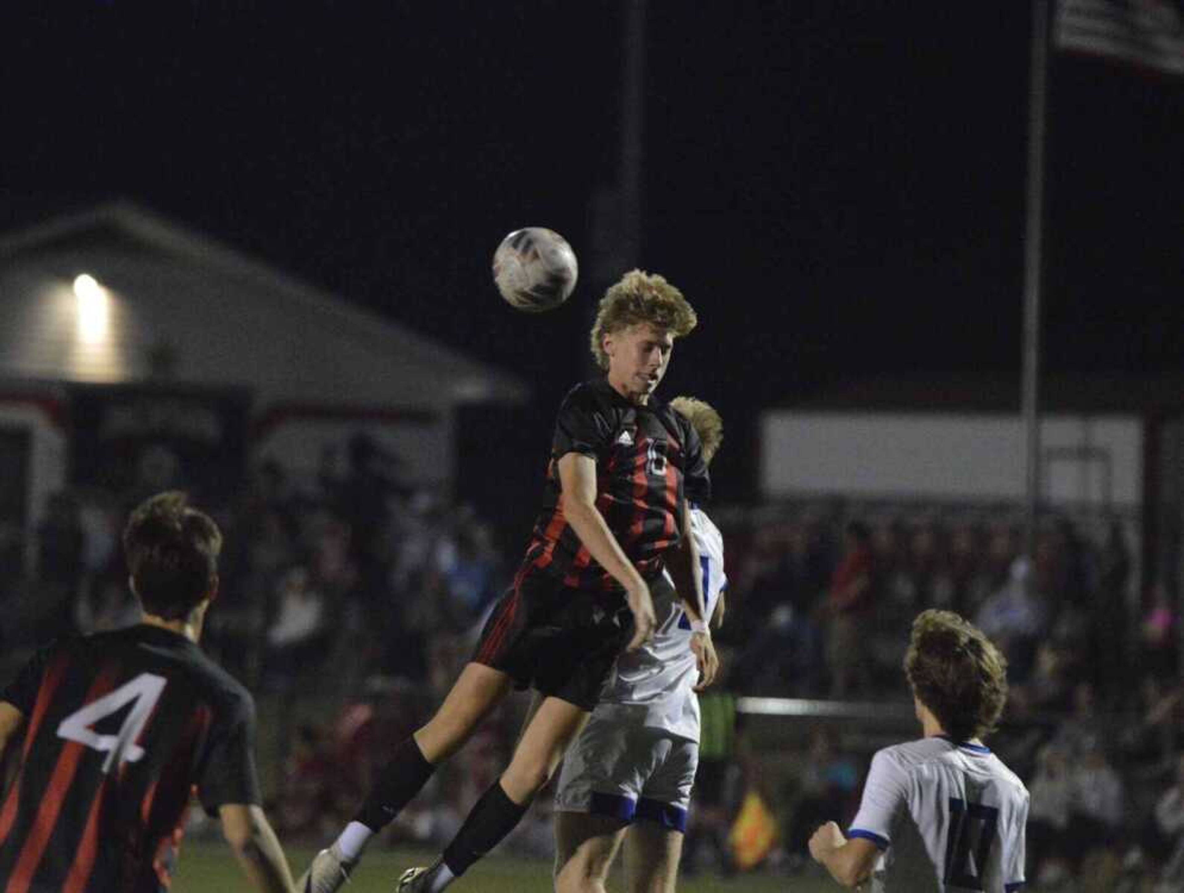 Jackson junior Mason Jackson heads the ball against Notre Dame on Oct. 29 in Jackson.