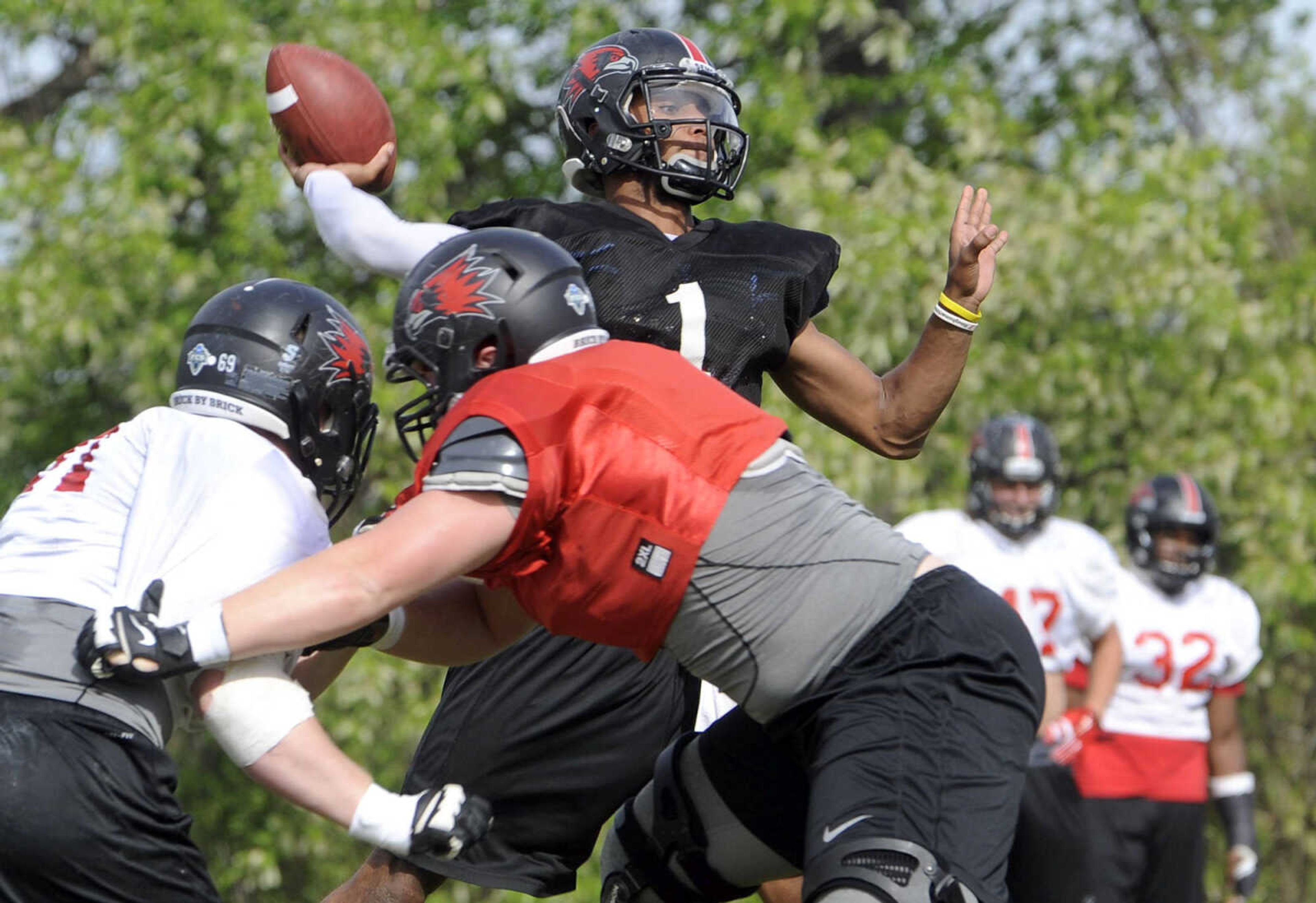 FRED LYNCH ~ flynch@semissourian.com
Southeast Missouri State quarterback Dante Vandeven throws a pass during a spring practice Monday, April 18, 2016 at the Rosengarten Athletic Complex.