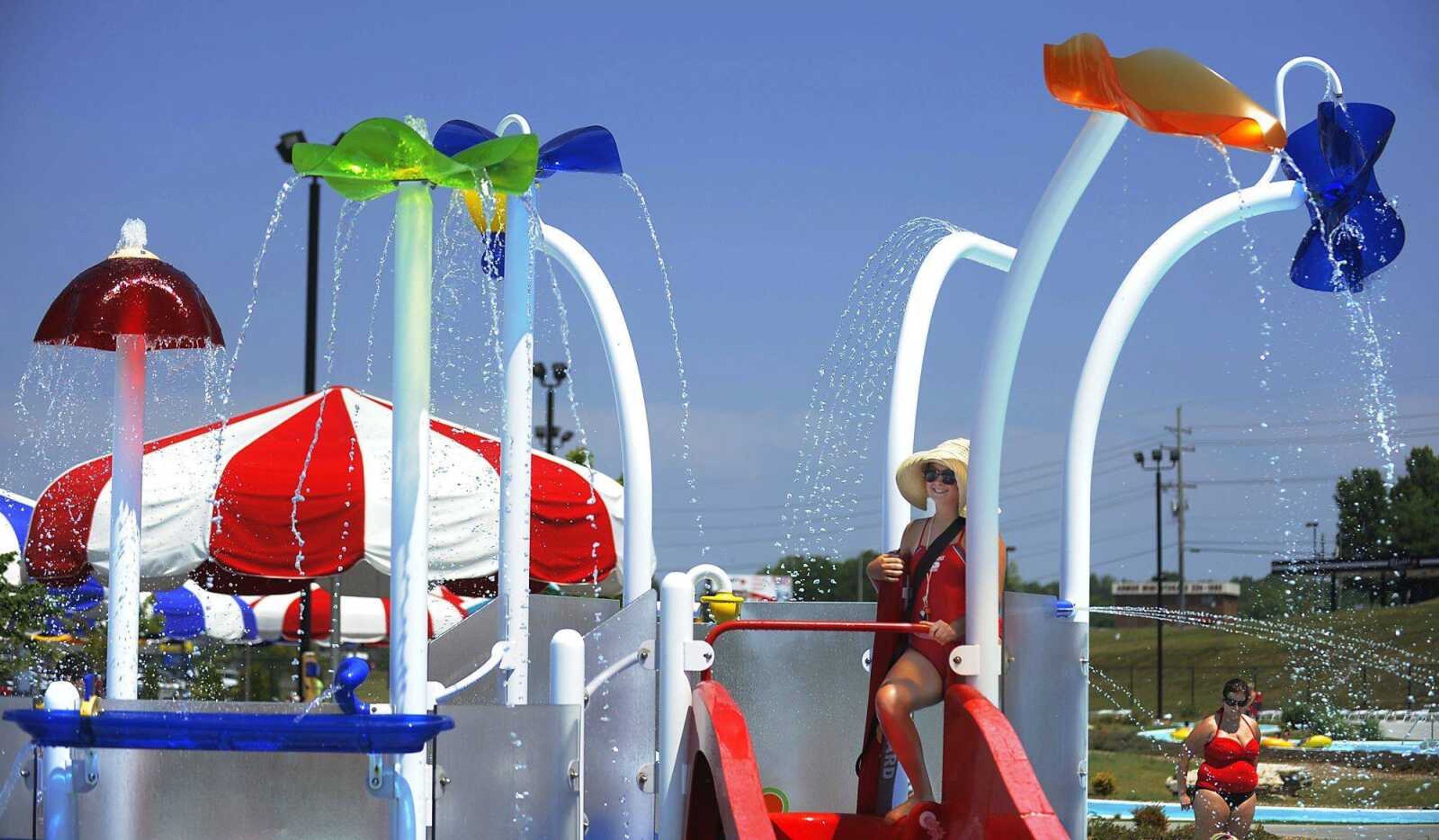 Lifeguard Hanna Bagot, 17, watches as kids go down a water-slide Saturday at Cape Splash.ADAM VOGLERavogler@semissourian.com