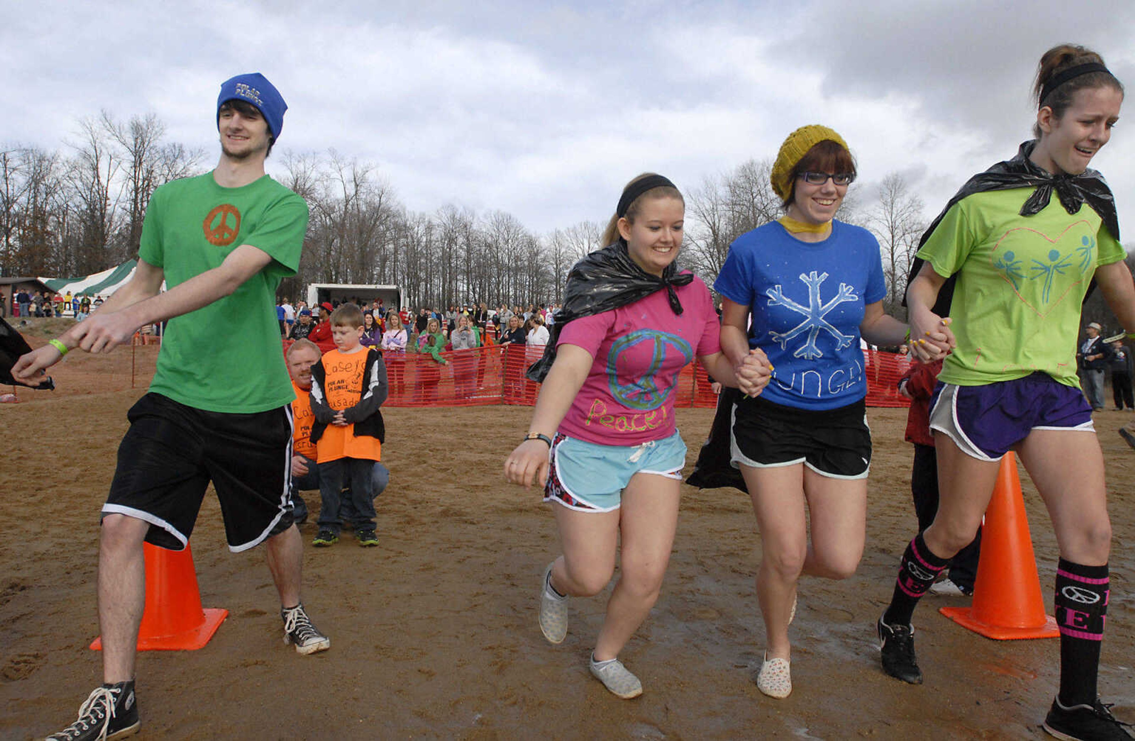 KRISTIN EBERTS ~ keberts@semissourian.com

Plungers brave the water during the 2012 Polar Plunge at the Trail of Tears State Park's Lake Boutin on Saturday, Feb. 4, 2012.