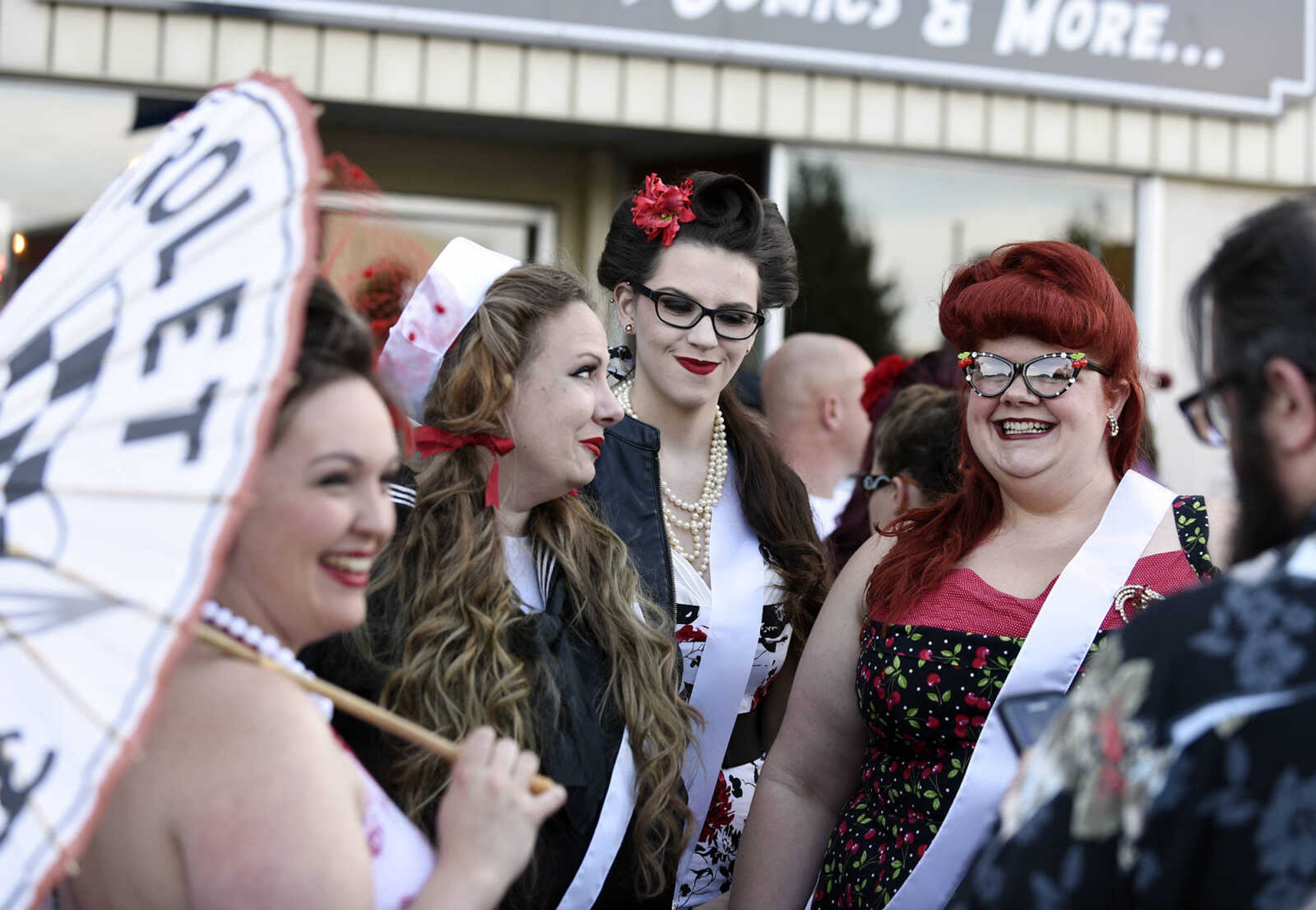 LAURA SIMON ~ lsimon@semissourian.com

Contestants, from left to right, Kelly Hughes, Danielle Schulte, Anna Lewis and Jamie Rich, mingle during the third annual Perryville Pin-Up contest on The Square on Saturday, Sept. 3, 2016. Please look for a feature on the pin-up contest in next Sunday's Good Times section of the Southeast Missourian.