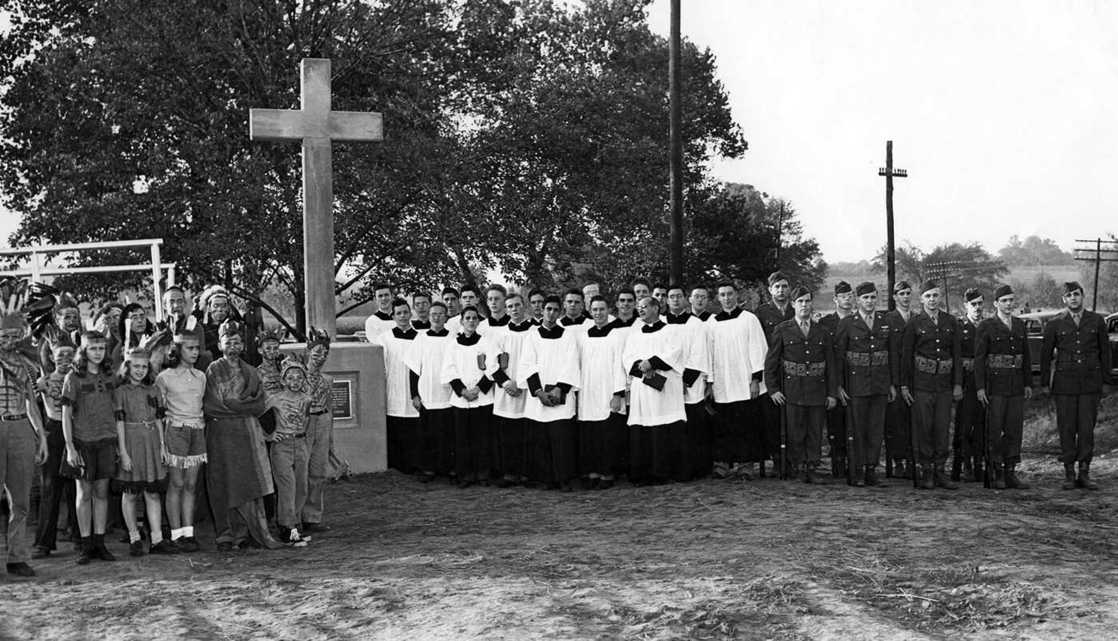 In the presence of 250 persons on Oct. 12, 1947, a cross was unveiled at the point on Highway 61 where it is intersected by Cape LaCroix Creek. The cross memorializes the erection of a cross at the creek's mouth by French missionaries in 1699. (Fronabarger pic)