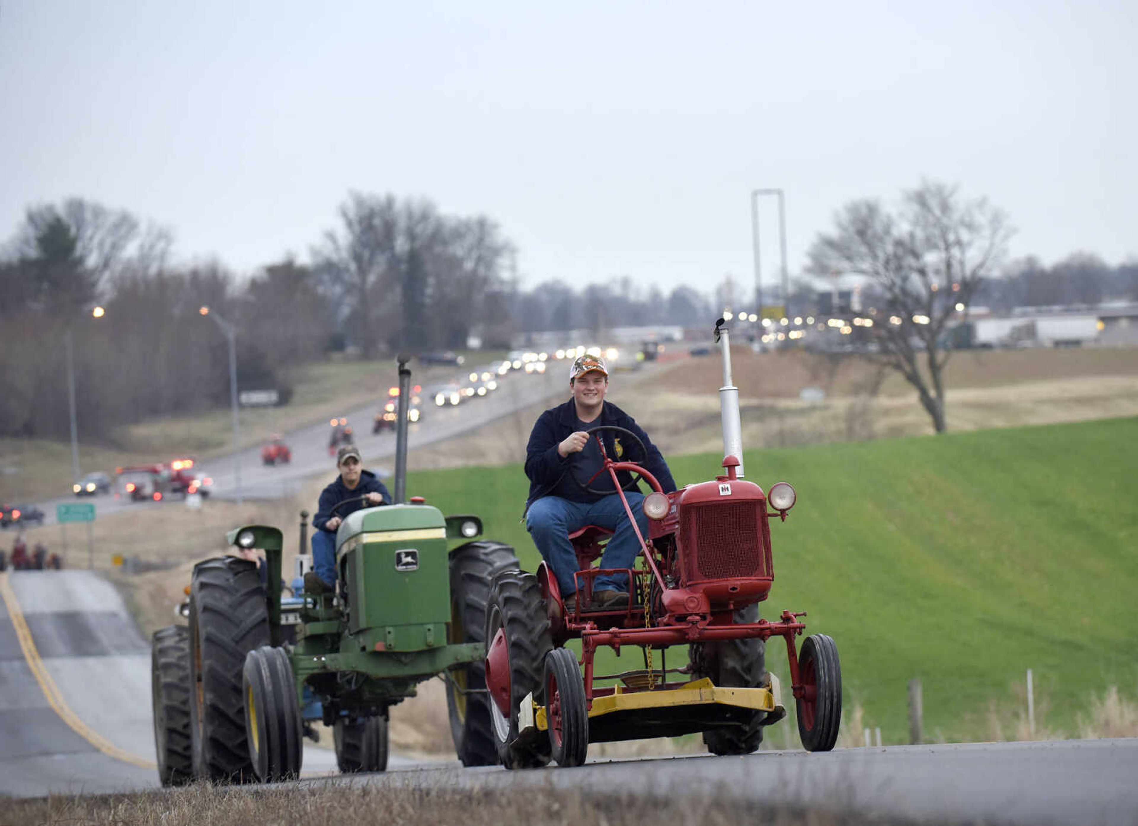 Saxony Lutheran High School FFA students take to the road on their tractors during drive your tractor to school day on Tuesday morning, Feb. 21, 2017. Students began their journey to school from Davis Farm Supply on Highway 61 in Jackson as part of FFA Week.