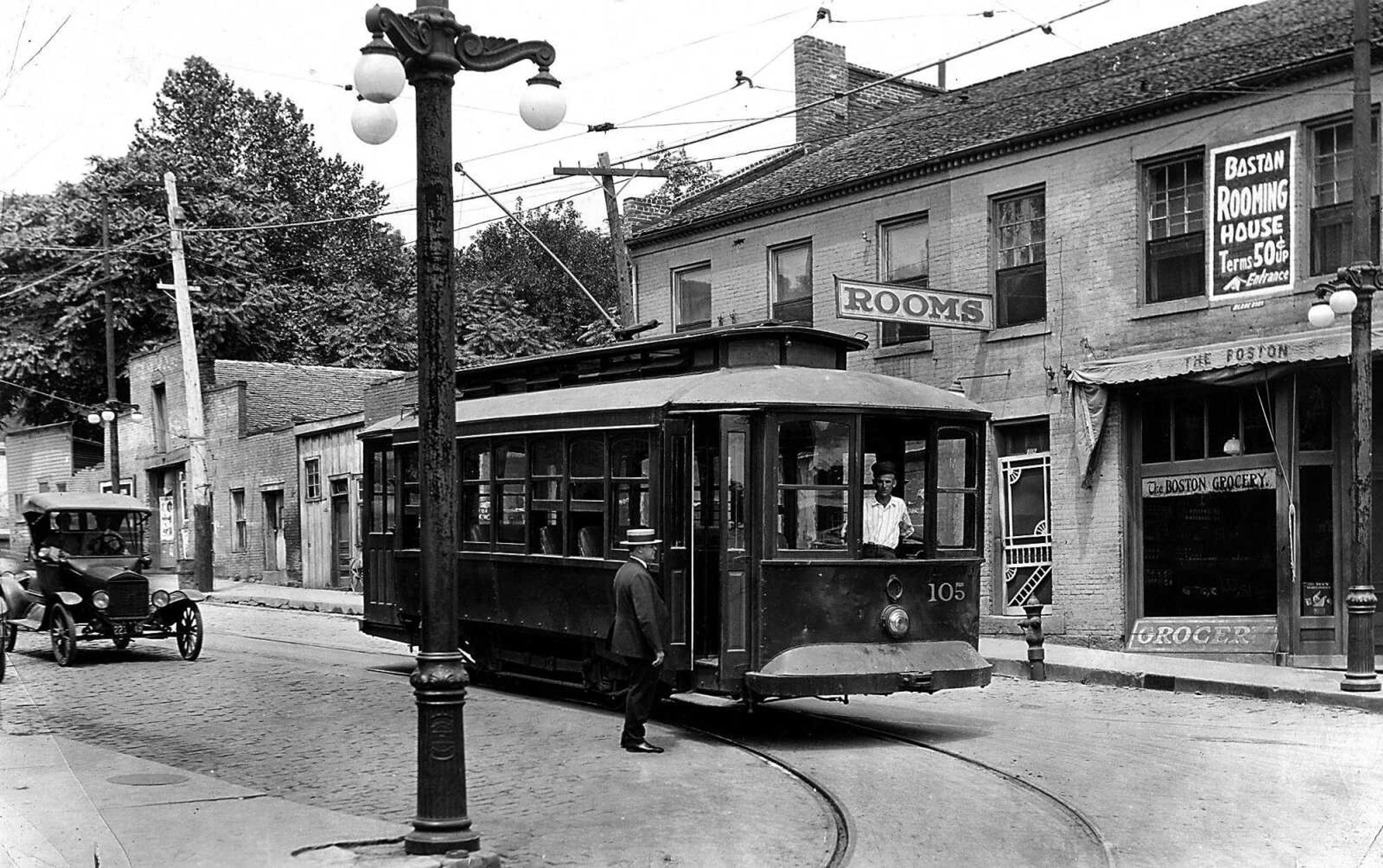 From 1893 through 1934, trolley cars provided transportation through Cape Girardeau.  A passenger prepares to baord an electric street car at the corner of Broadway and Main streets in downtown Cape Girardeau.