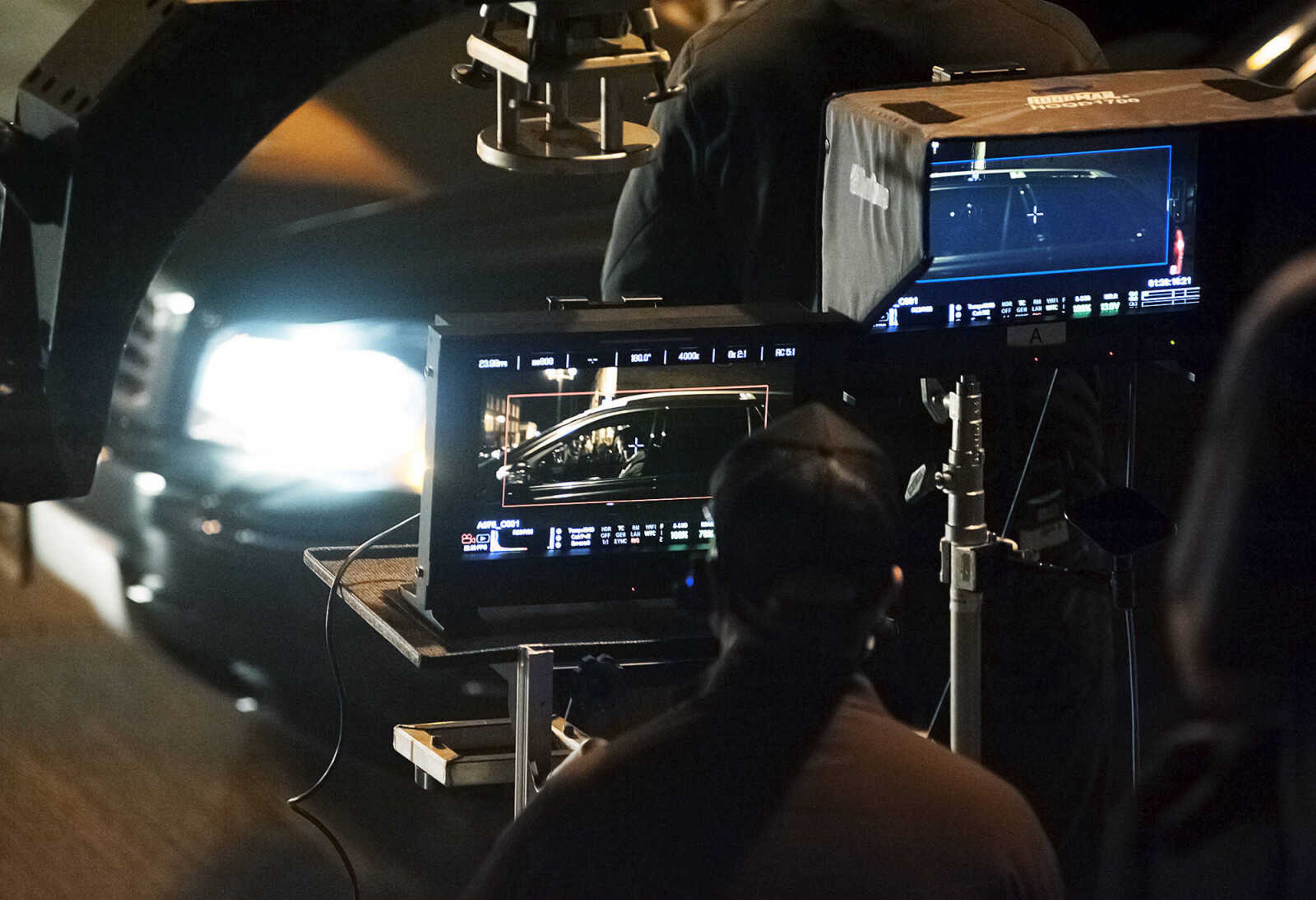 ADAM VOGLER ~ avogler@semissourian.com
Crew members watch monitors as they rehearse a scene for the 20th Century Fox feature film "Gone Girl," Friday, Sept. 27, in downtown Cape Girardeau. The stand-in for actor Ben Affleck can be seen in the car's driver seat.